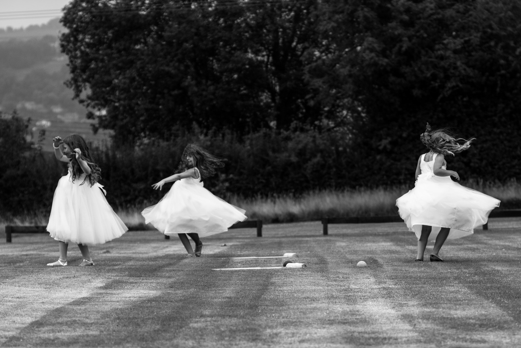 Canon EF 70-200mm F2.8L IS USM sample photo. Spinning flower girls photography