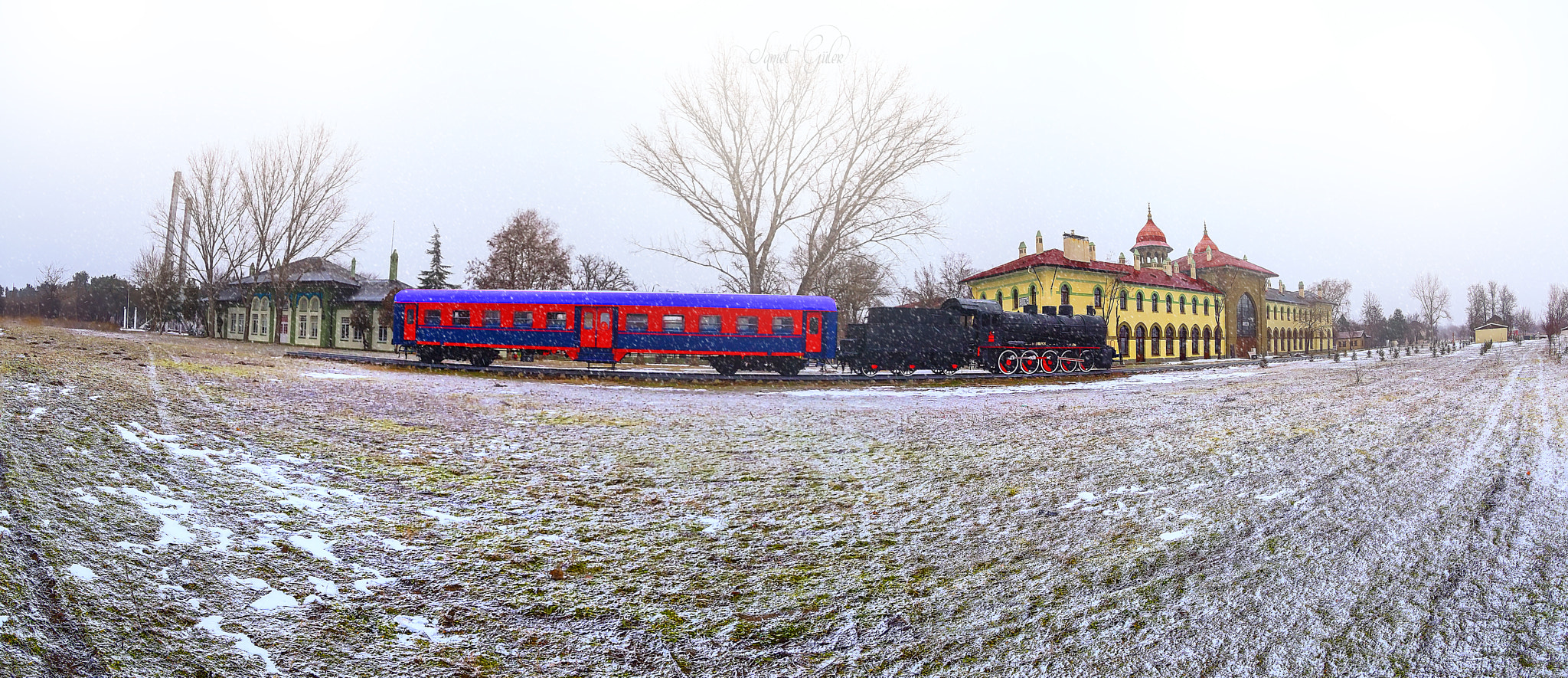 Canon EOS 6D + Canon EF 8-15mm F4L Fisheye USM sample photo. Black train and snow photography