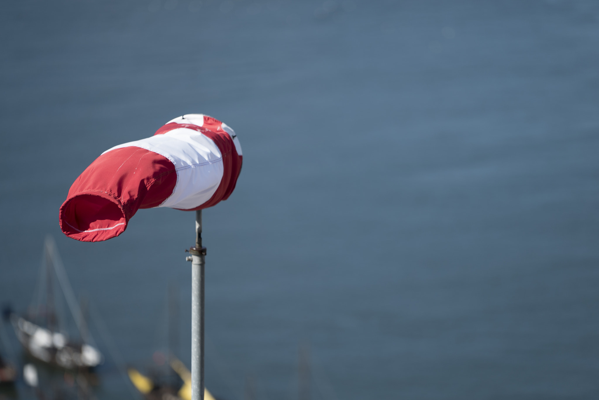 Sony a7S + Sony FE 70-200mm F4 G OSS sample photo. Windsock on douro river in porto photography