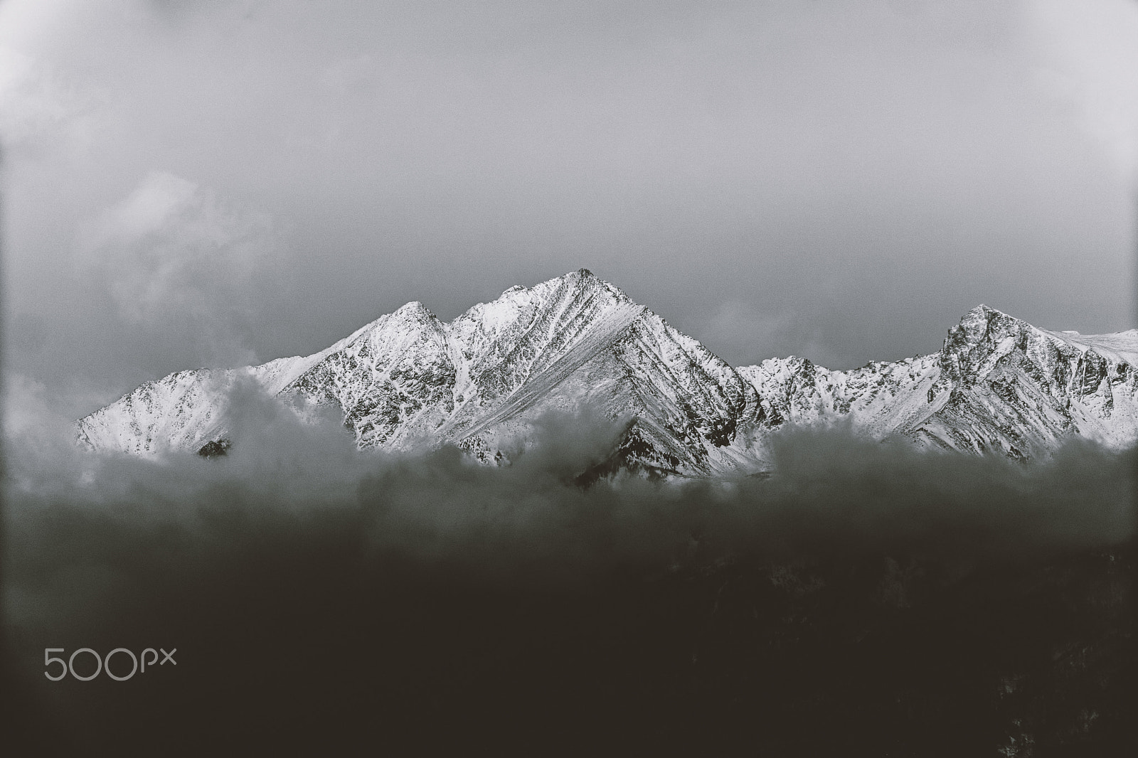 Sony a6300 + Canon EF 70-200mm F4L USM sample photo. Black and white mountains in winter photography