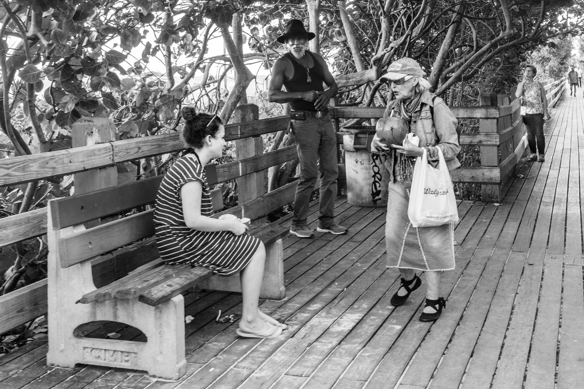 35mm F2.0 sample photo. A morning walk - chatting, the old fashion way.. photography