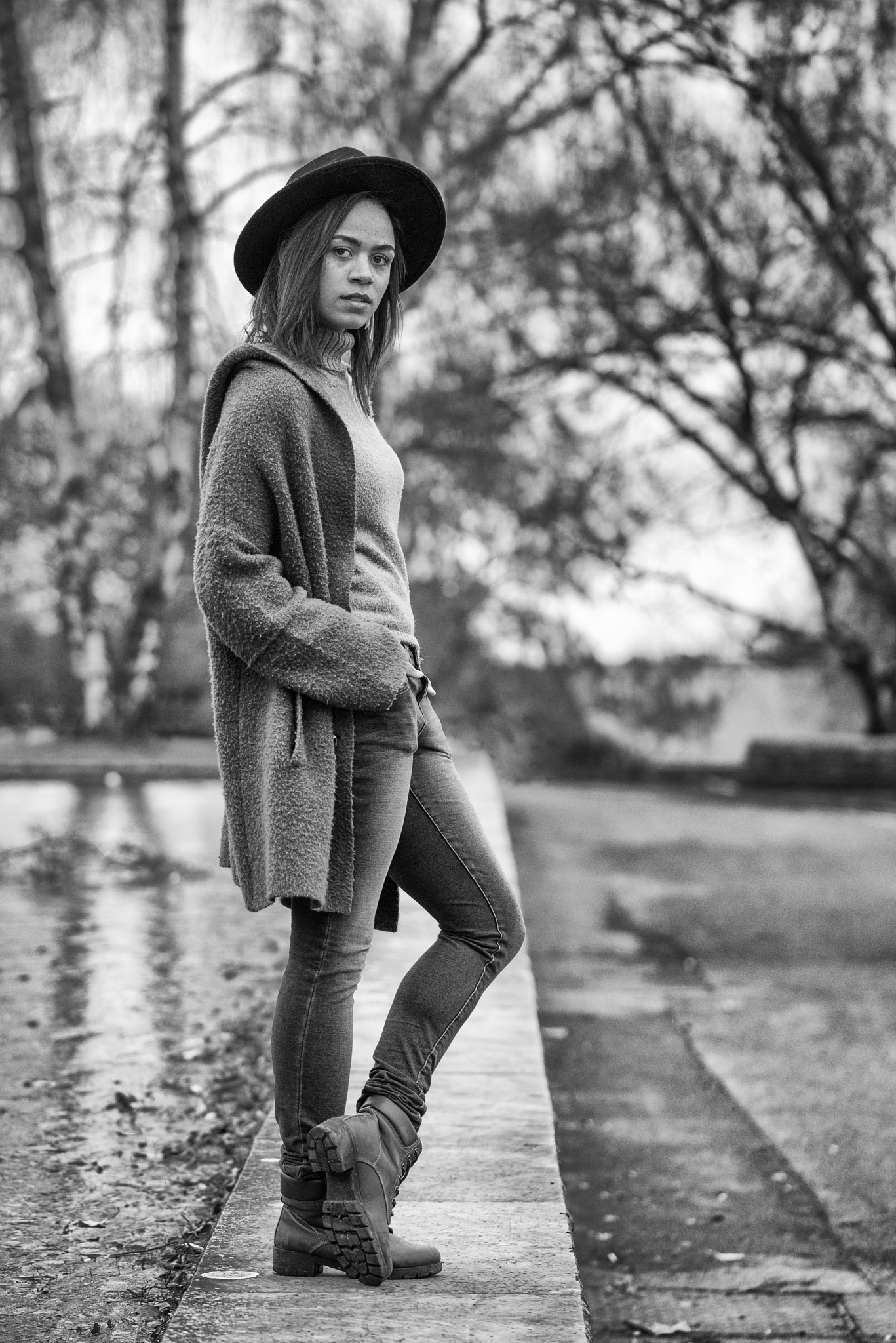 105mm F2.8 sample photo. Alisha with hat photography