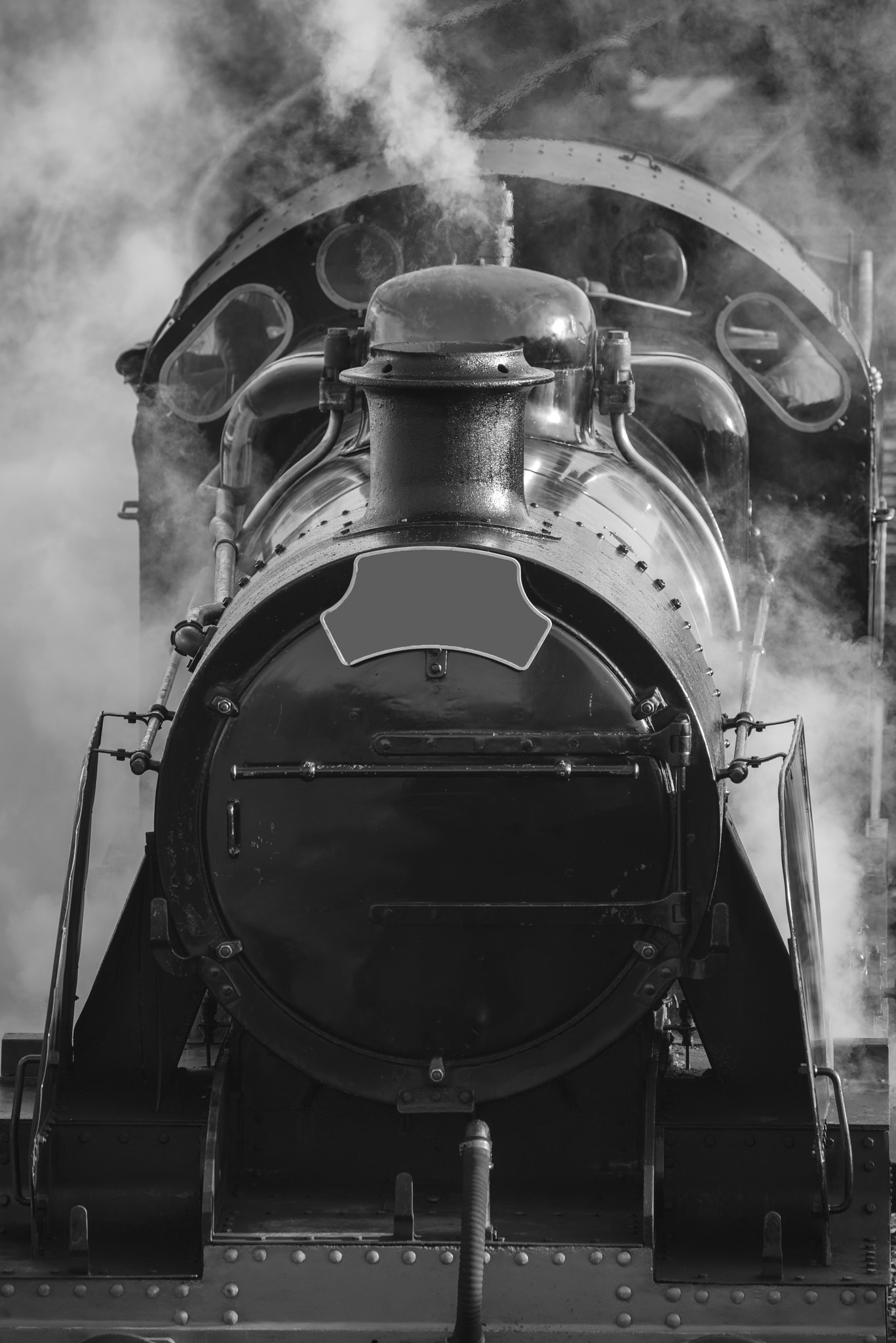 Sigma 150-600mm F5-6.3 DG OS HSM | C sample photo. Restored victorian era steam train engine with full steam in bla photography