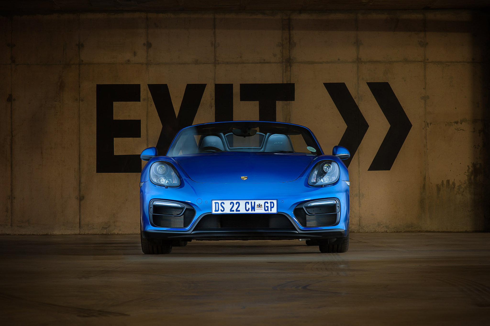 Blue Porsche Boxster front view