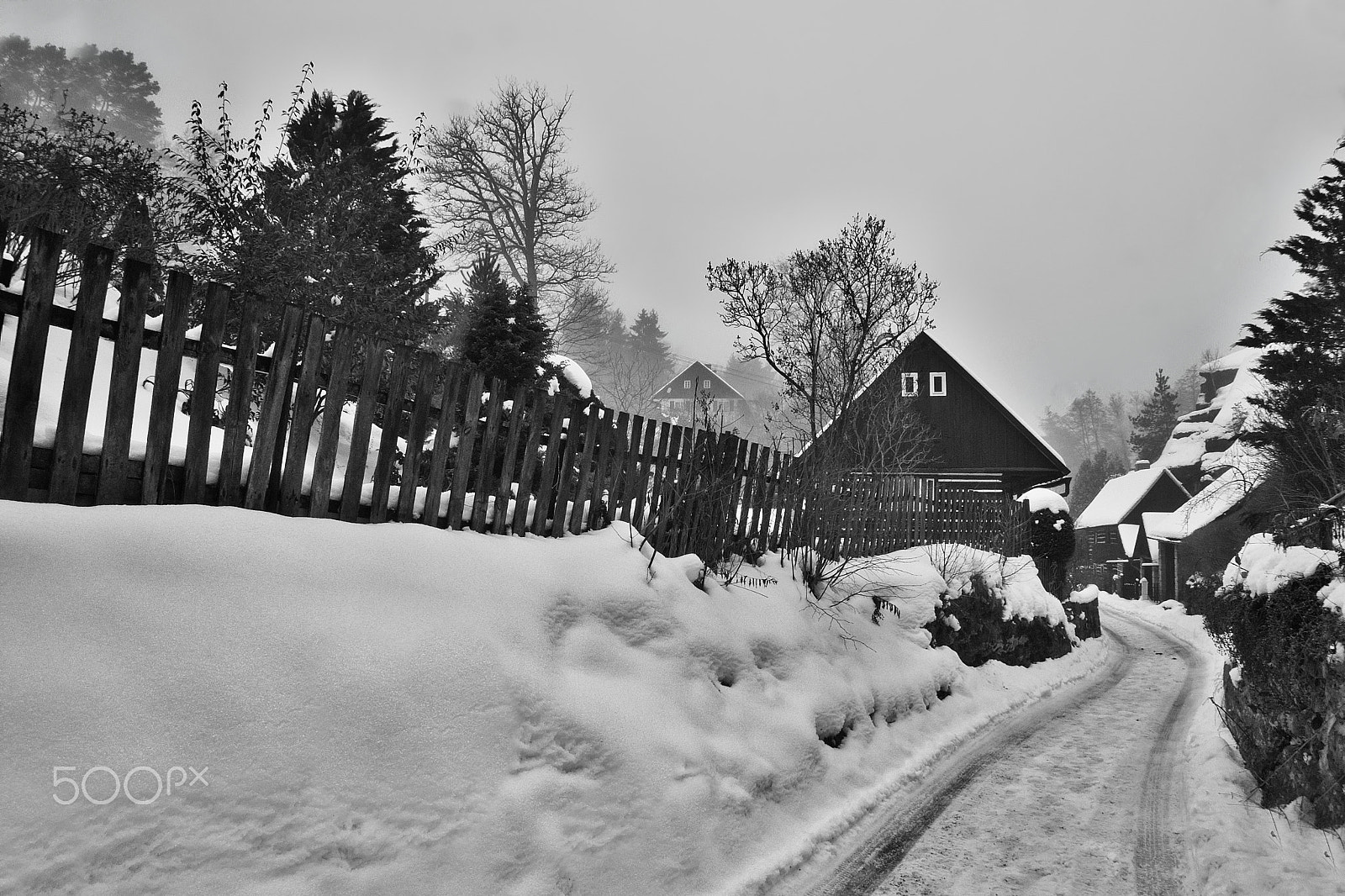 Nikon Coolpix P6000 sample photo. Karba, machuv kraj, czech republic - february 04, 2017: wooden cottages and rock on background in... photography