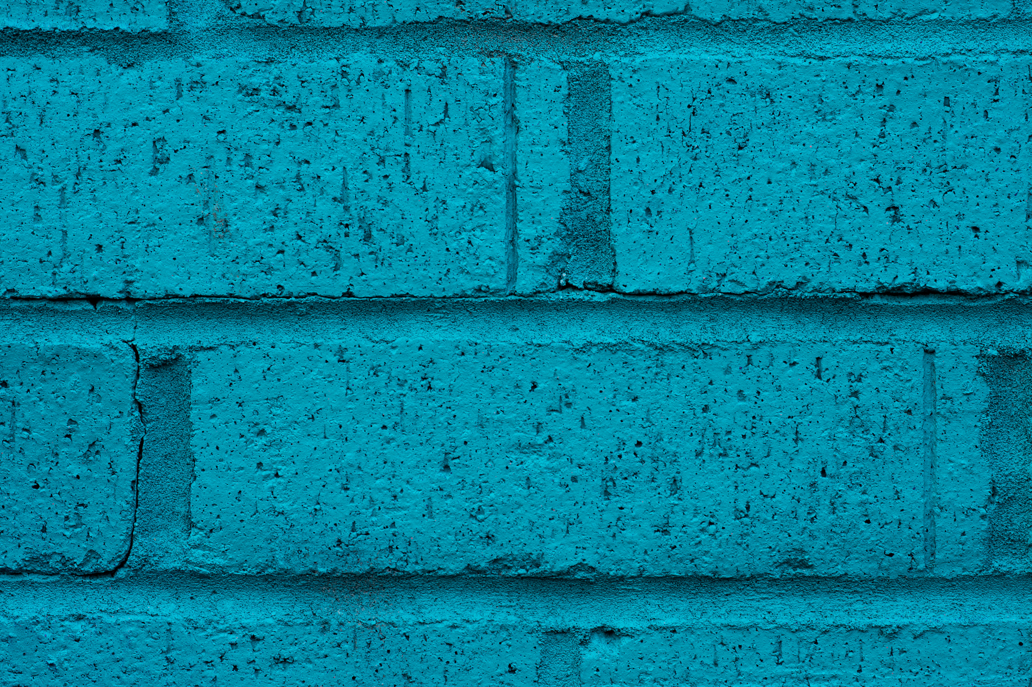 Nikon D4S + Nikon AF-S Nikkor 85mm F1.8G sample photo. Close up of turquoise brick wall photography