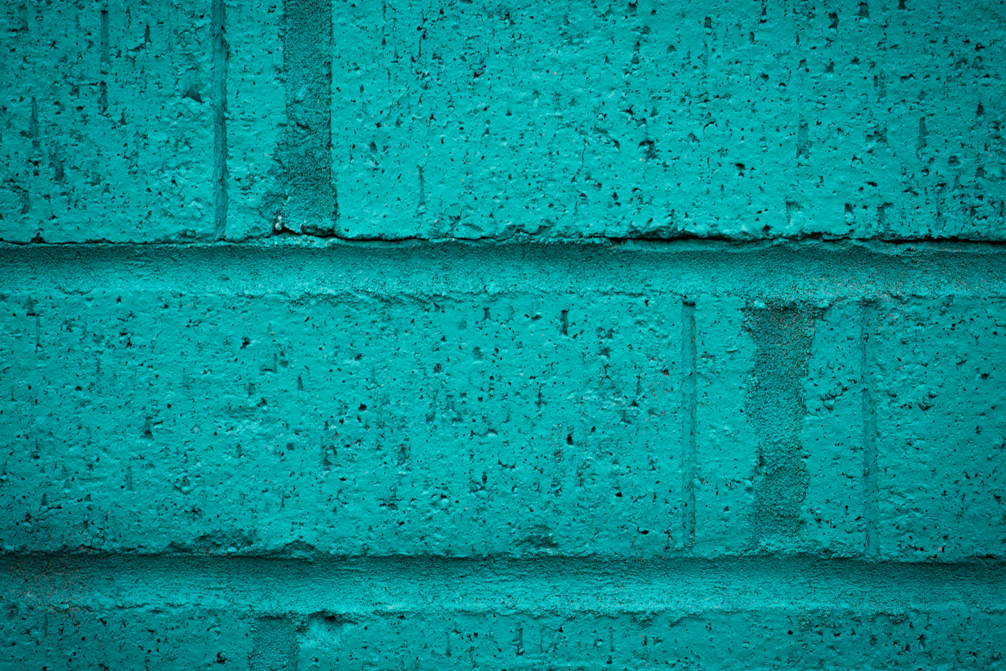 Nikon D4S + Nikon AF-S Nikkor 85mm F1.8G sample photo. Close up of turquoise brick wall photography