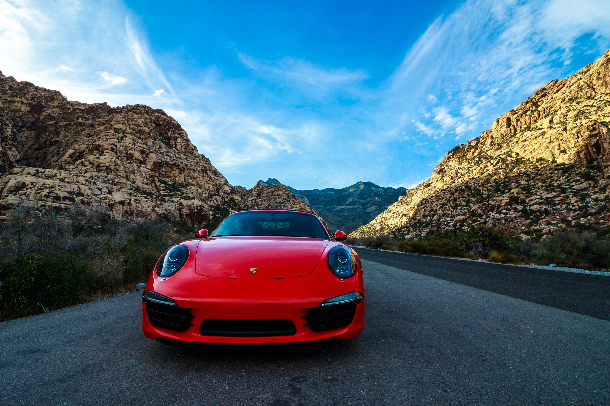 Canon EOS 700D (EOS Rebel T5i / EOS Kiss X7i) + Canon EF-S 10-18mm F4.5–5.6 IS STM sample photo. Red porsche photography