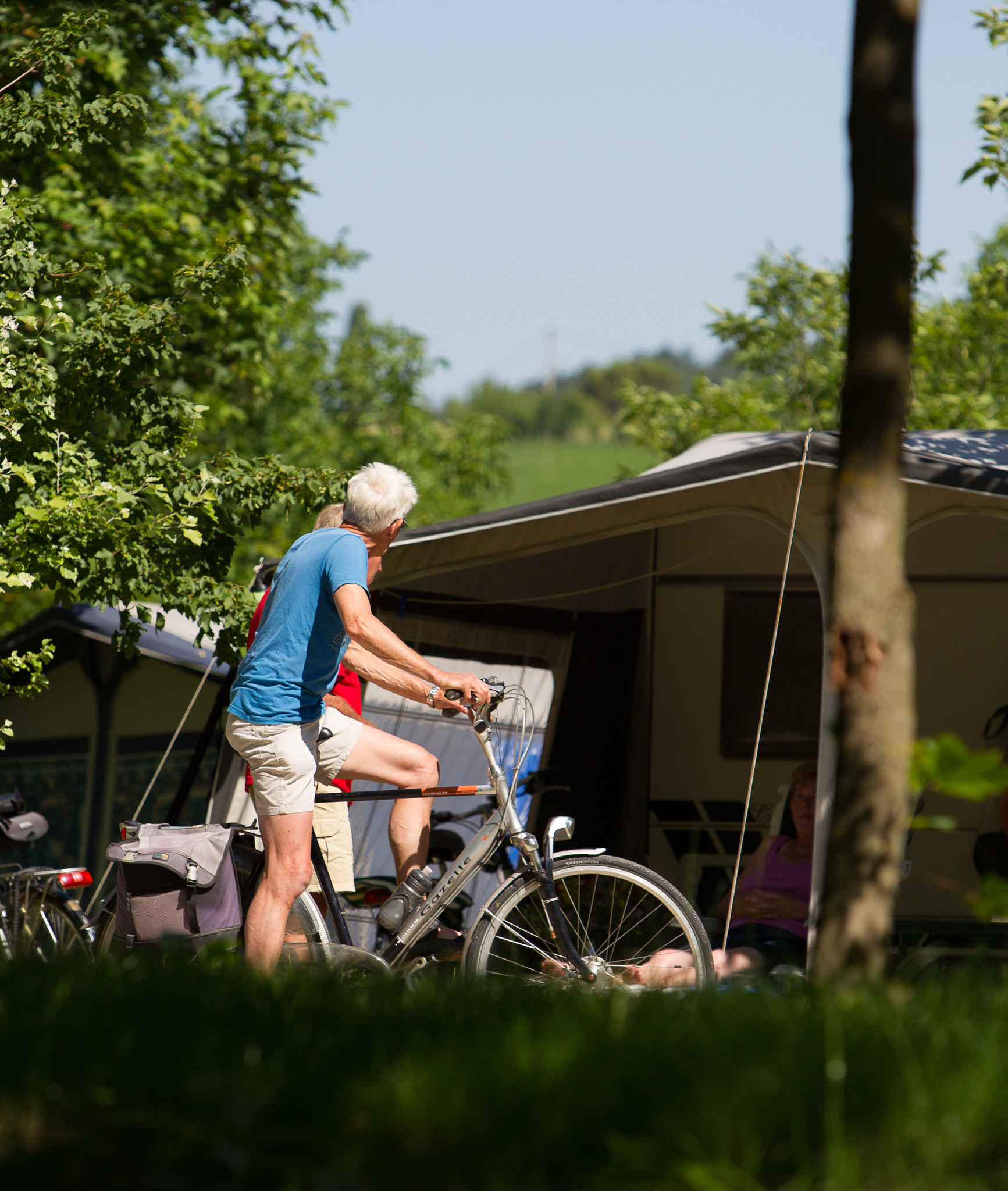 Canon EOS-1D Mark IV sample photo. Cycling on a campsite photography