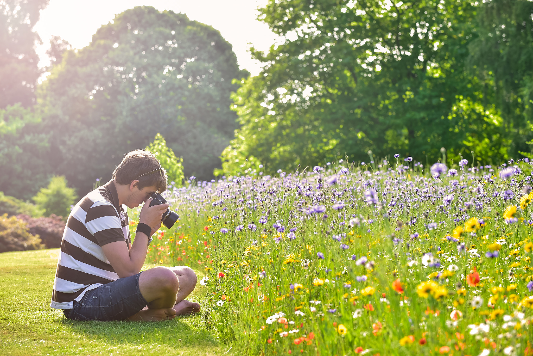 Nikon D4S sample photo. Young handsome caucasian photographer in botanic gardens photography