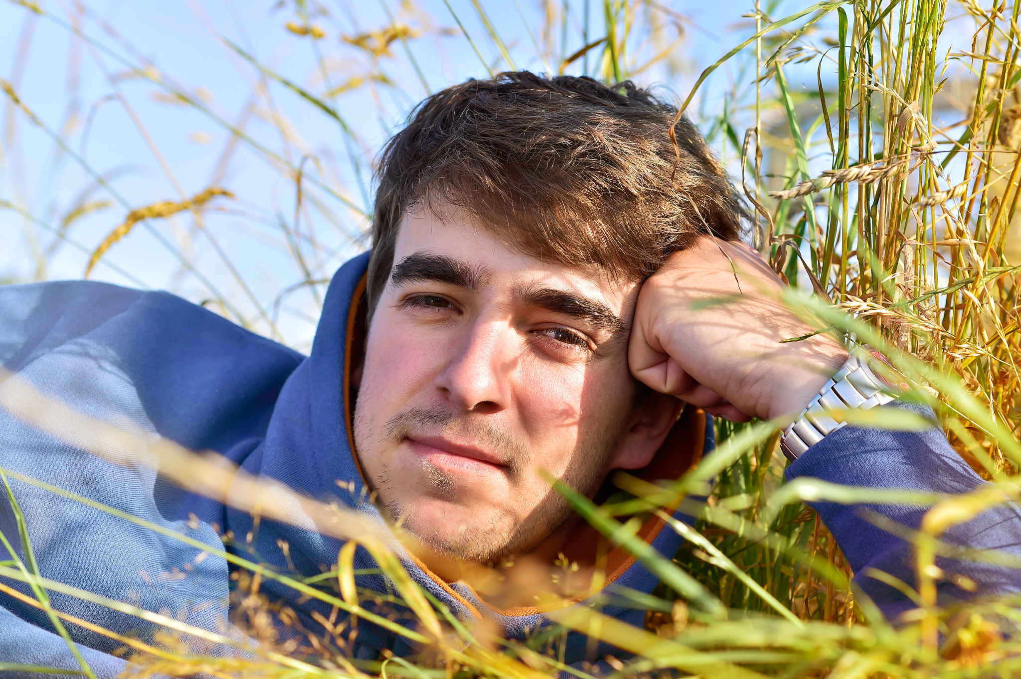 Nikon D4S + Nikon AF-S Nikkor 85mm F1.8G sample photo. Young man outdoors portrait with copy space photography