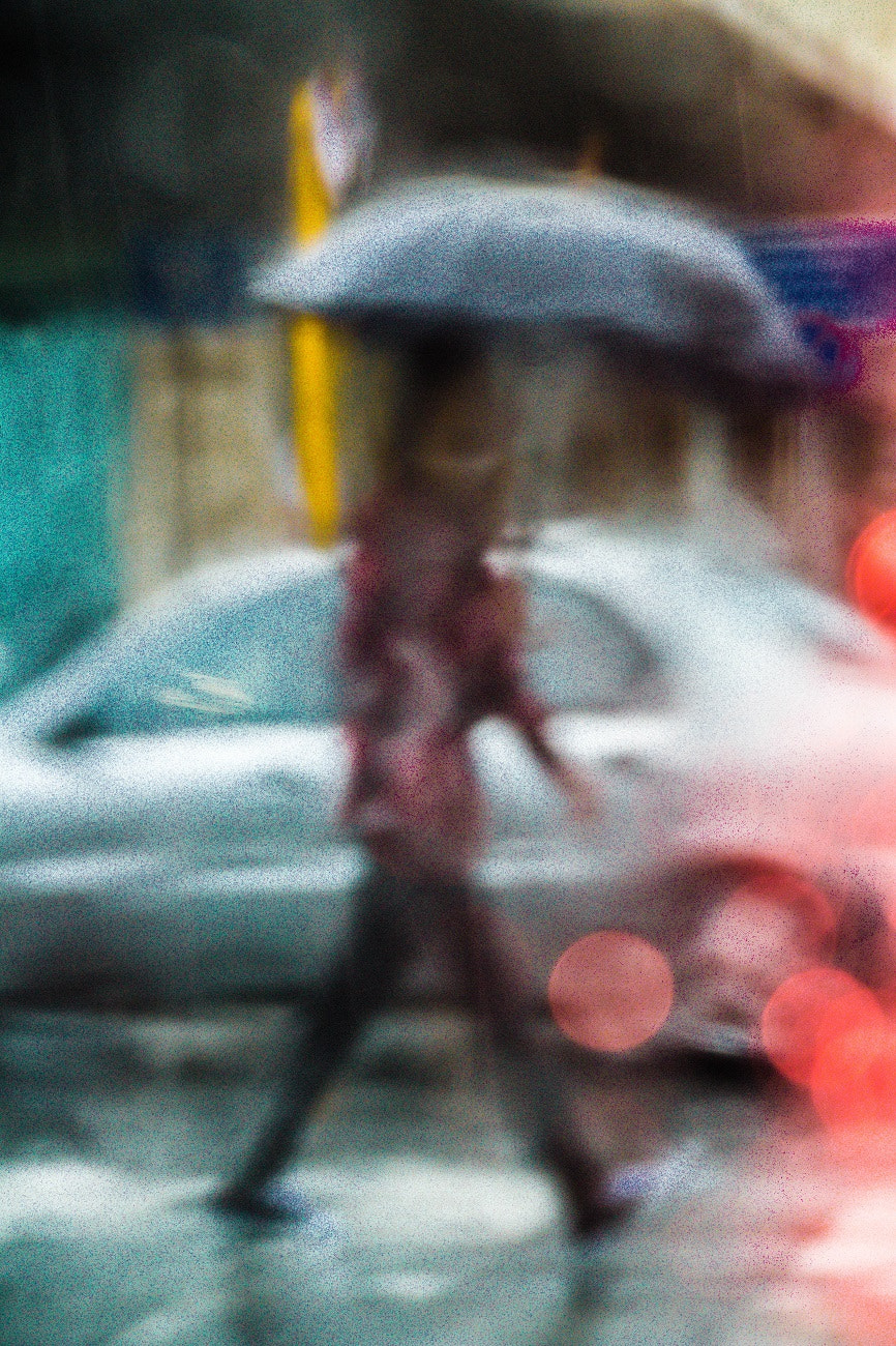 Sigma 18-250mm F3.5-6.3 DC OS HSM sample photo. Walking in the rain photography