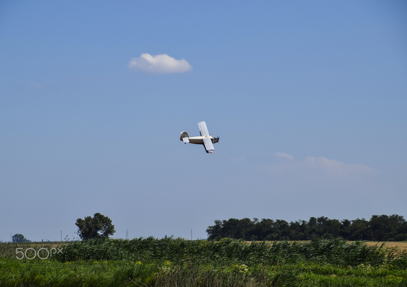 Nikon D3300 + Tamron 16-300mm F3.5-6.3 Di II VC PZD Macro sample photo. The spraying of fertilizers and pesticides on the field with the aircraft. photography