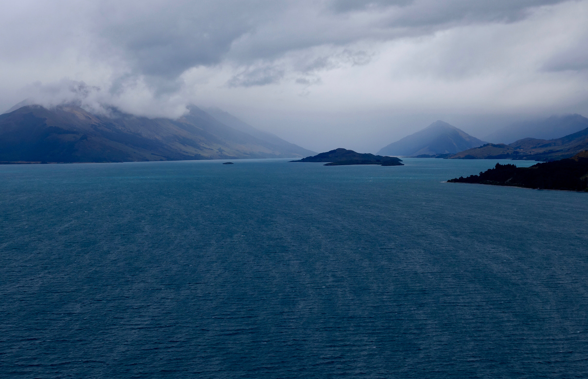 Sony 28-100mm F1.8-4.9 sample photo. Lake wakatipu on a rainy day photography