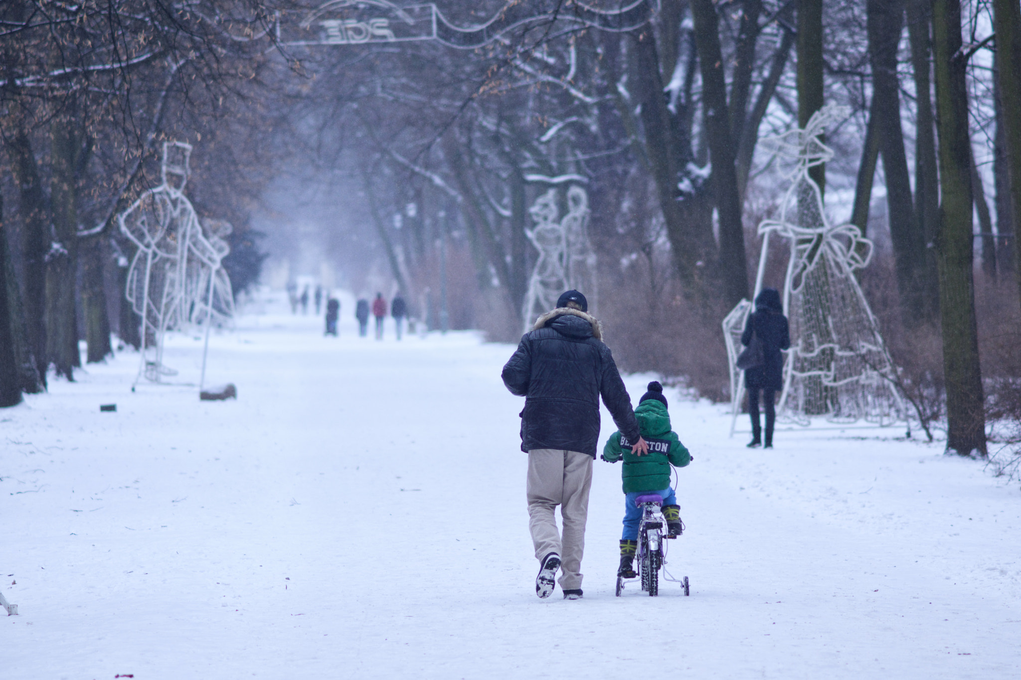 Minolta AF 135mm F2.8 sample photo. Learning to ride a bike with snow. photography