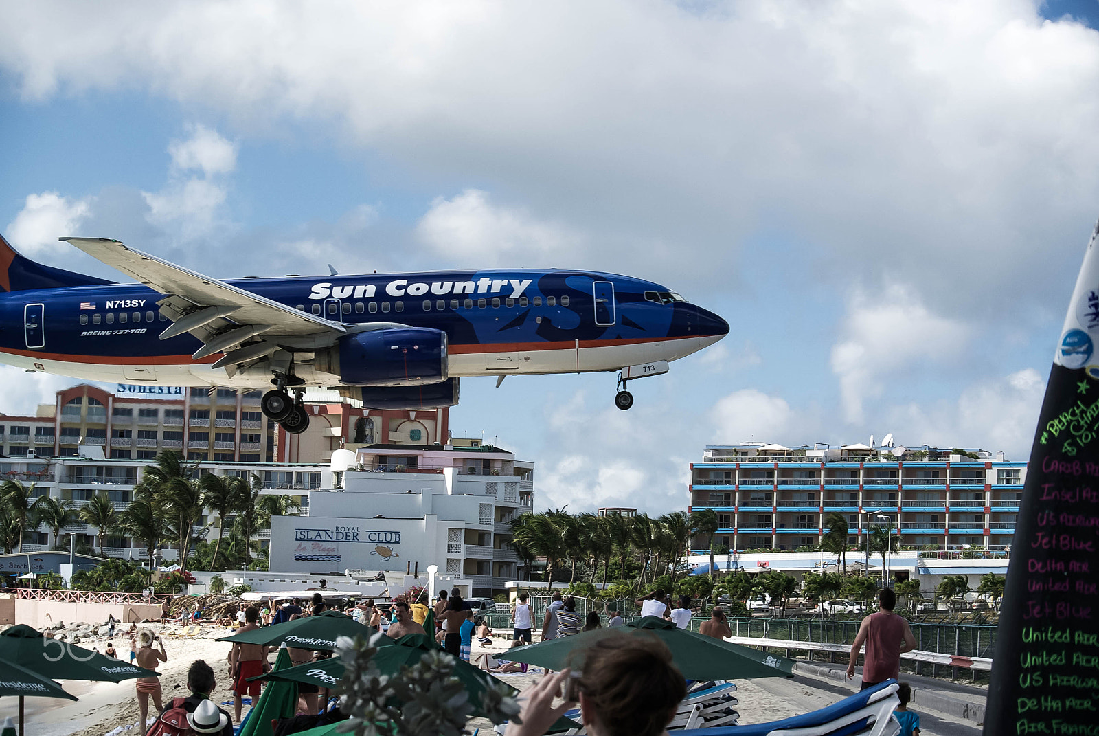 Nikon 1 Nikkor VR 30-110mm F3.8-5.6 sample photo. Boeing 737 sun country at sxm photography