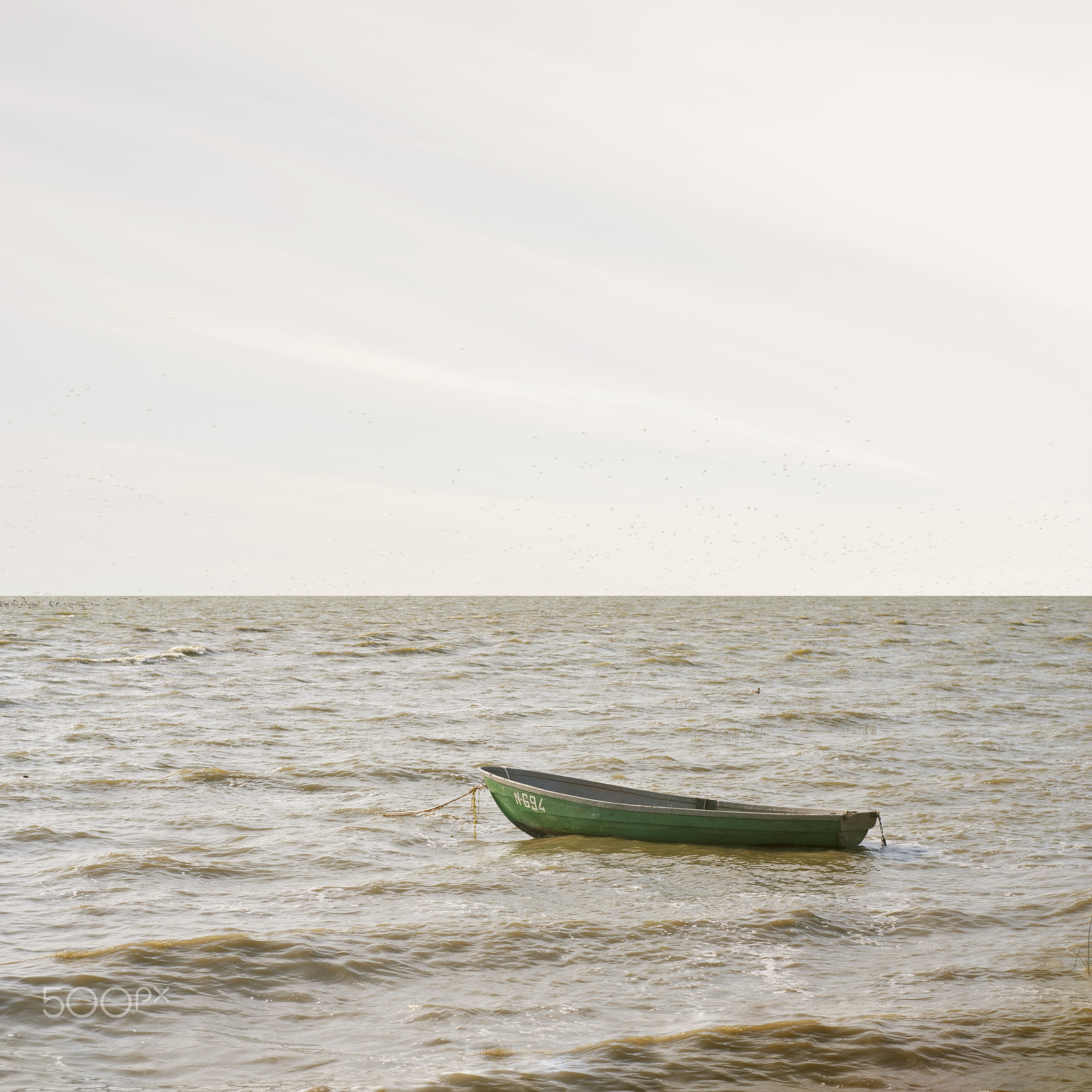 Nikon D80 sample photo. Abandoned boat floating on a laggon photography
