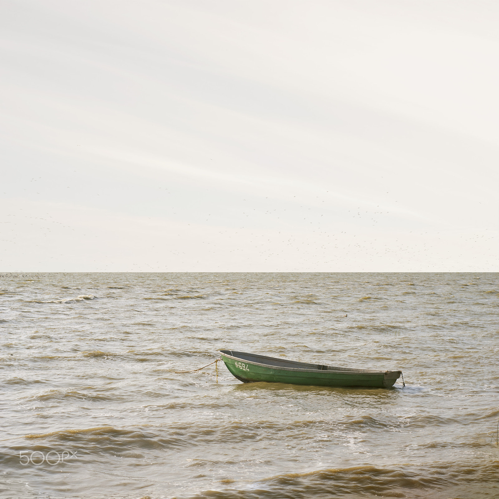 Nikon D80 + Nikon AF Nikkor 50mm F1.8D sample photo. Abandoned boat floating on a laggon photography