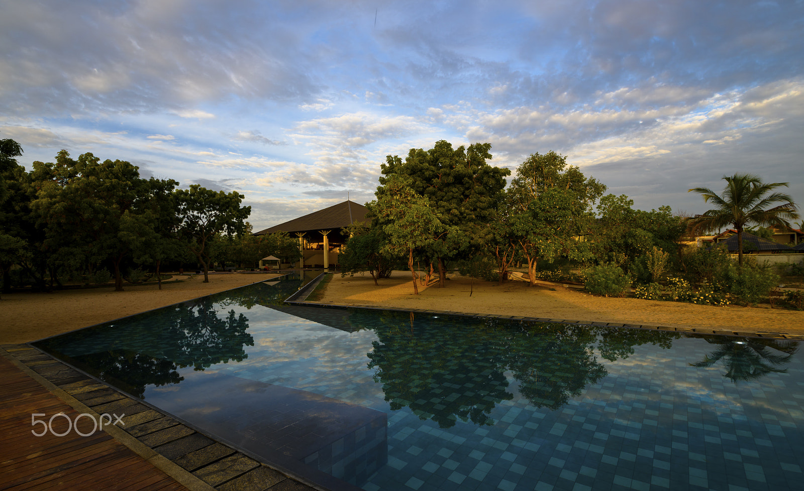 Nikon D810 sample photo. Swimming pool and building in early morning photography