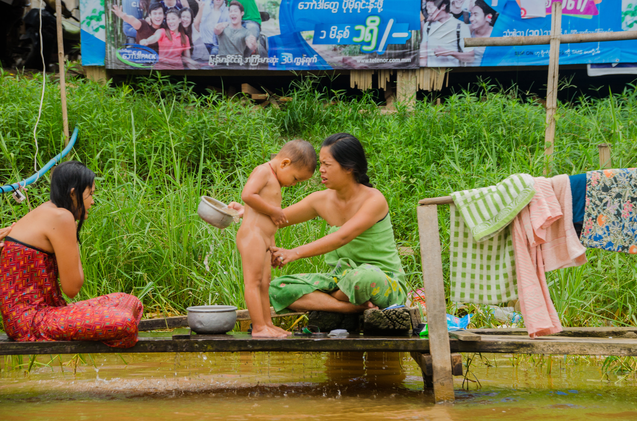Sigma 18-250mm F3.5-6.3 DC Macro OS HSM sample photo. Lotus people photography