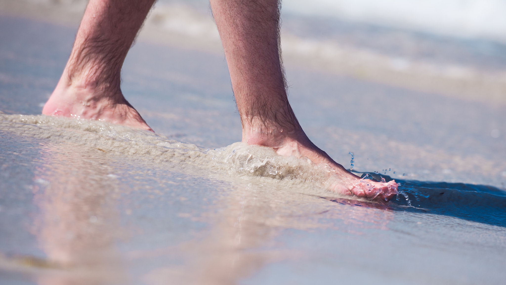 Nikon D3S sample photo. Male bare feet in a warm sand, man taking a walk on a sunny beac photography