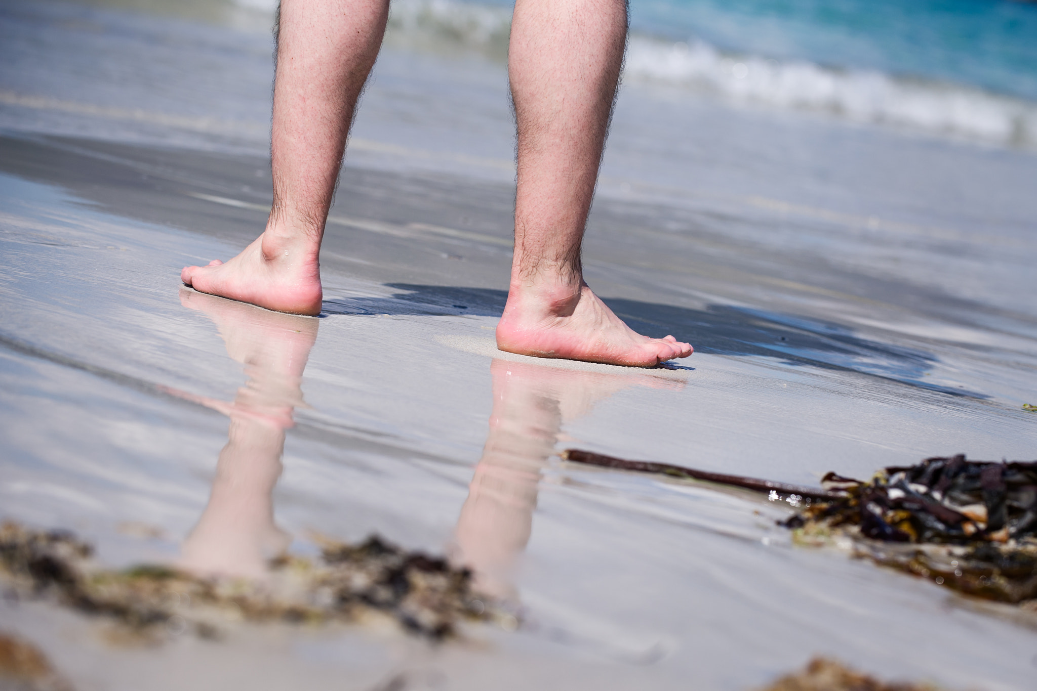 Nikon D3S sample photo. Male bare feet in a warm sand, man taking a walk on a sunny beach with turquoise water during... photography