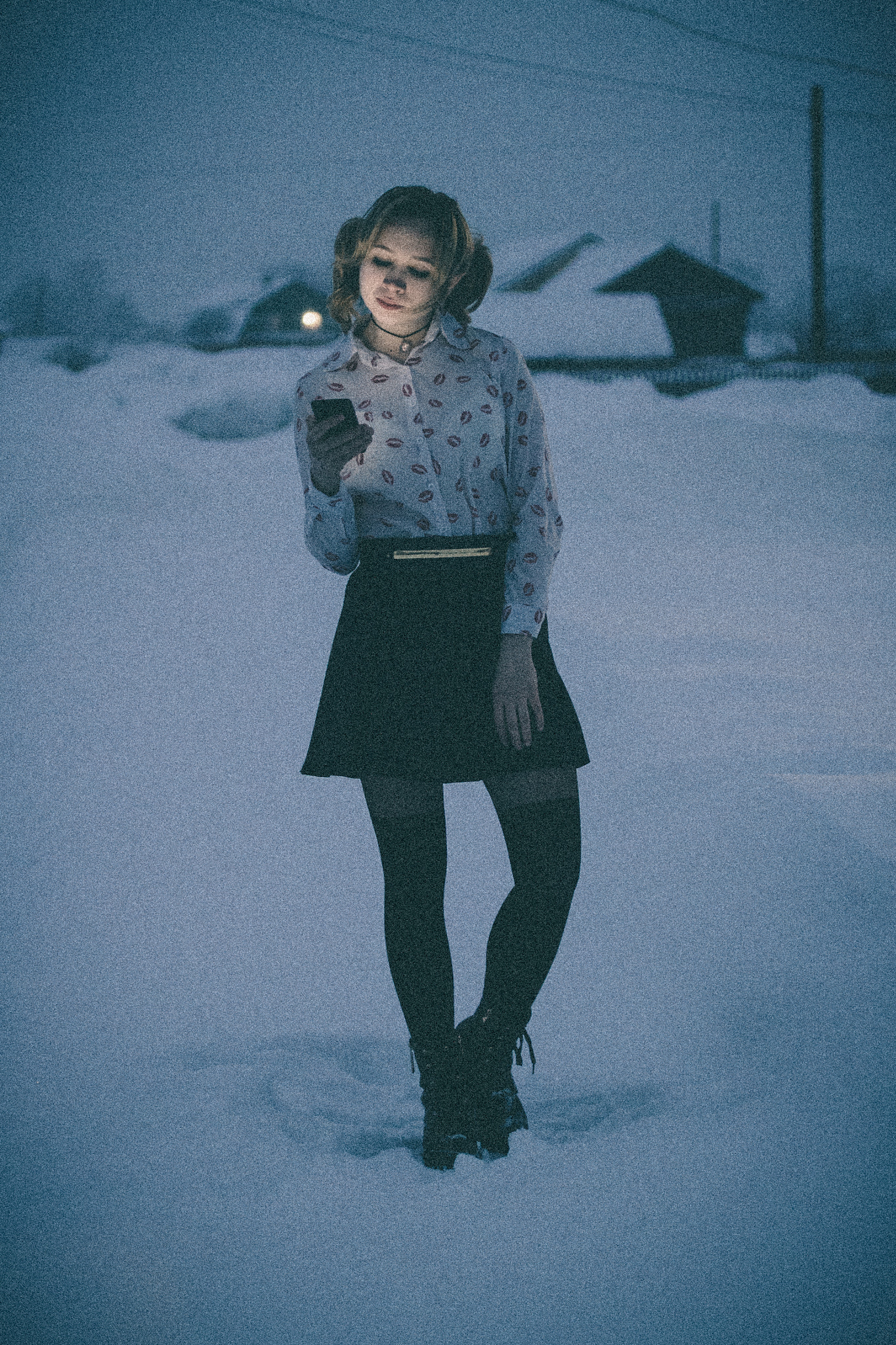 Canon EF 50mm F2.5 Macro sample photo. Portrait of a young girl with a phone on the street at night. photography