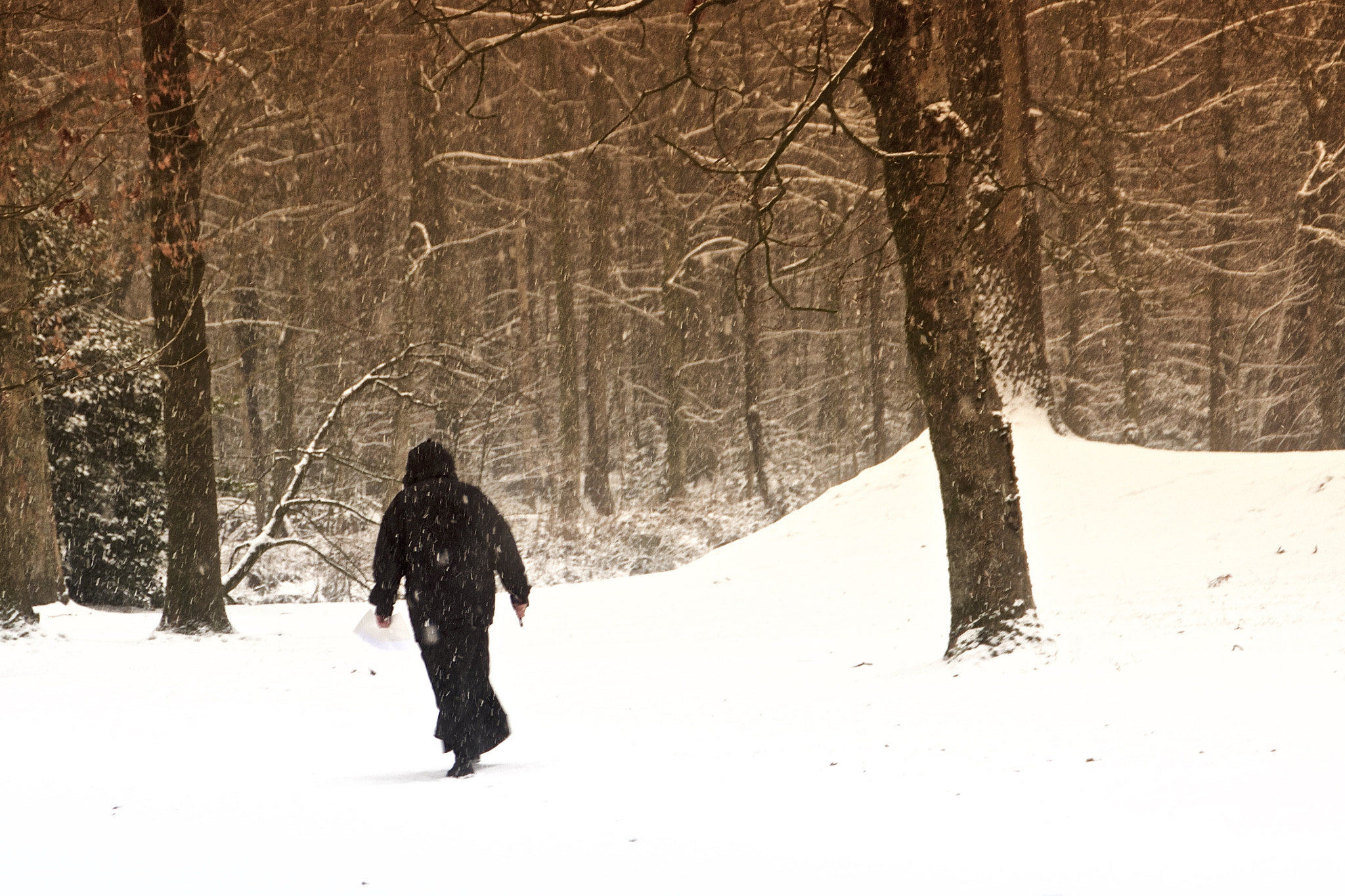 Canon EOS 60D sample photo. Nun in snowdrift photography