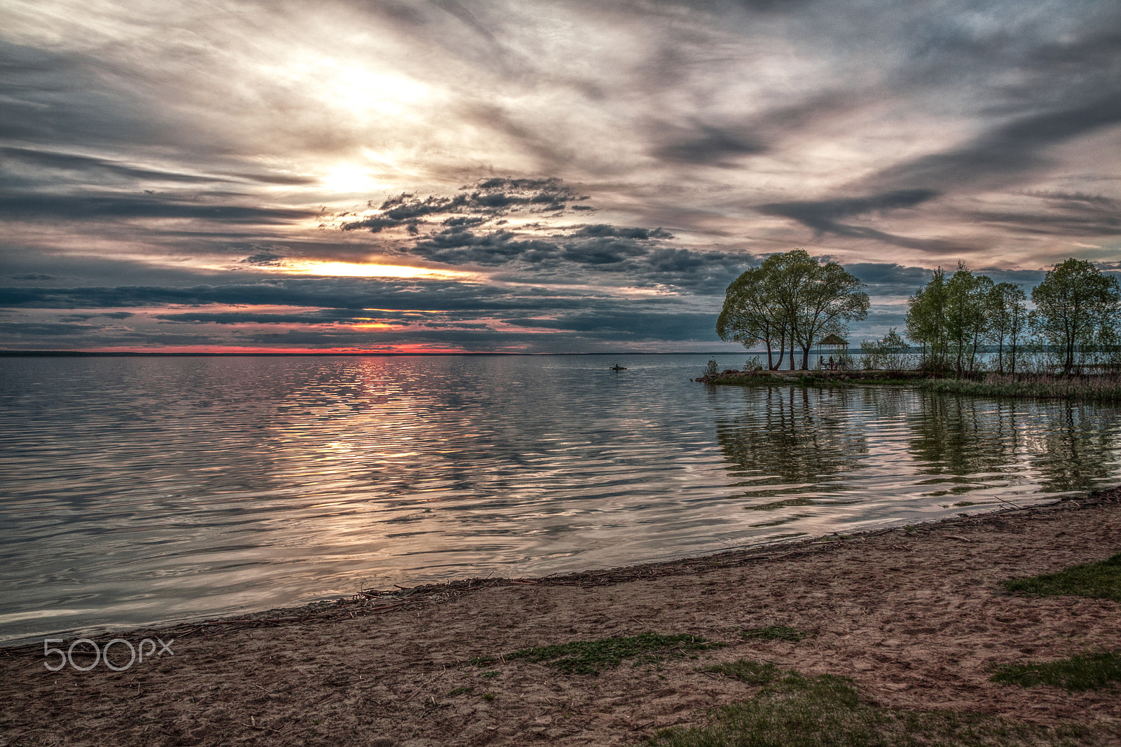 Canon EF 28-135mm F3.5-5.6 IS USM sample photo. Fisherman floats to the coast photography