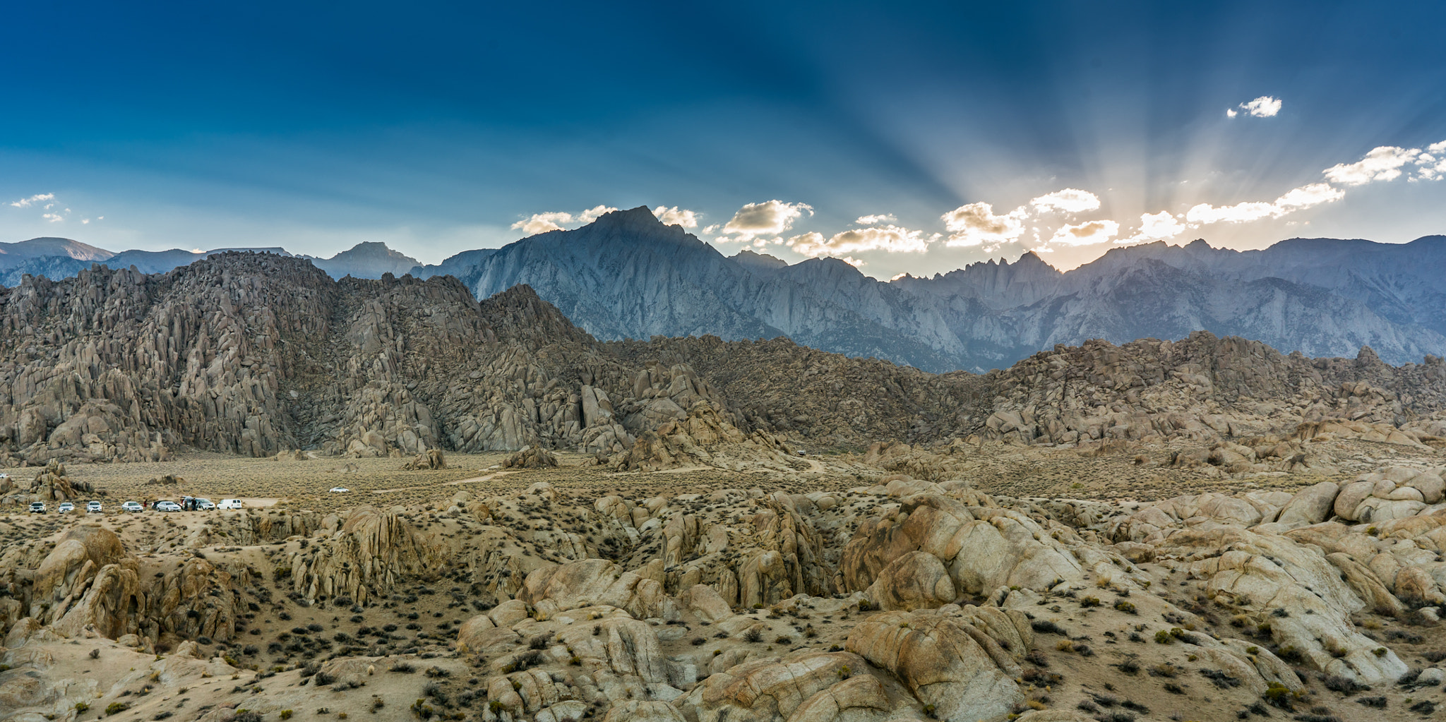 Sony FE 28mm F2 sample photo. Sun behind the mountains photography