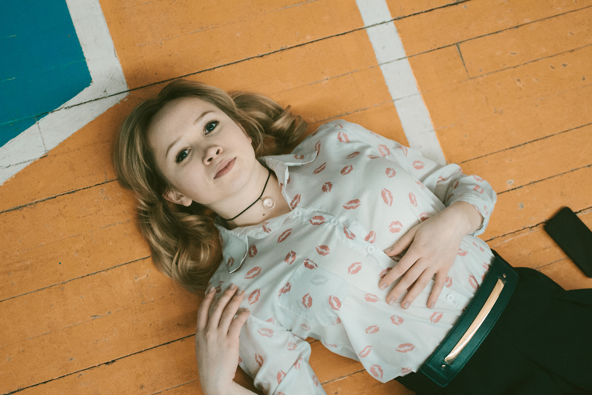 Canon EF 50mm F2.5 Macro sample photo. Portrait of a young girl lying on the floor. photography