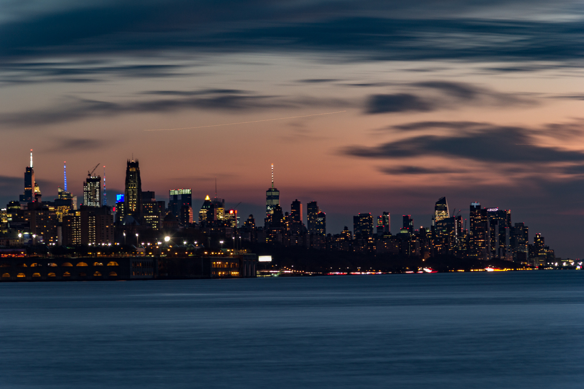 Canon EF 35-135mm f/4-5.6 USM sample photo. A look at the city before the storm. it was taken from under a bridge photography