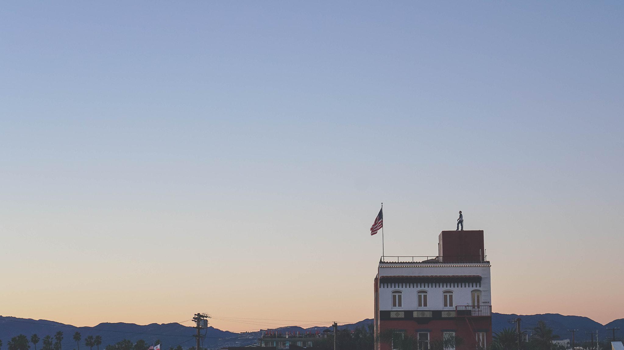 Sony E 35mm F1.8 OSS sample photo. Man watching sunset photography