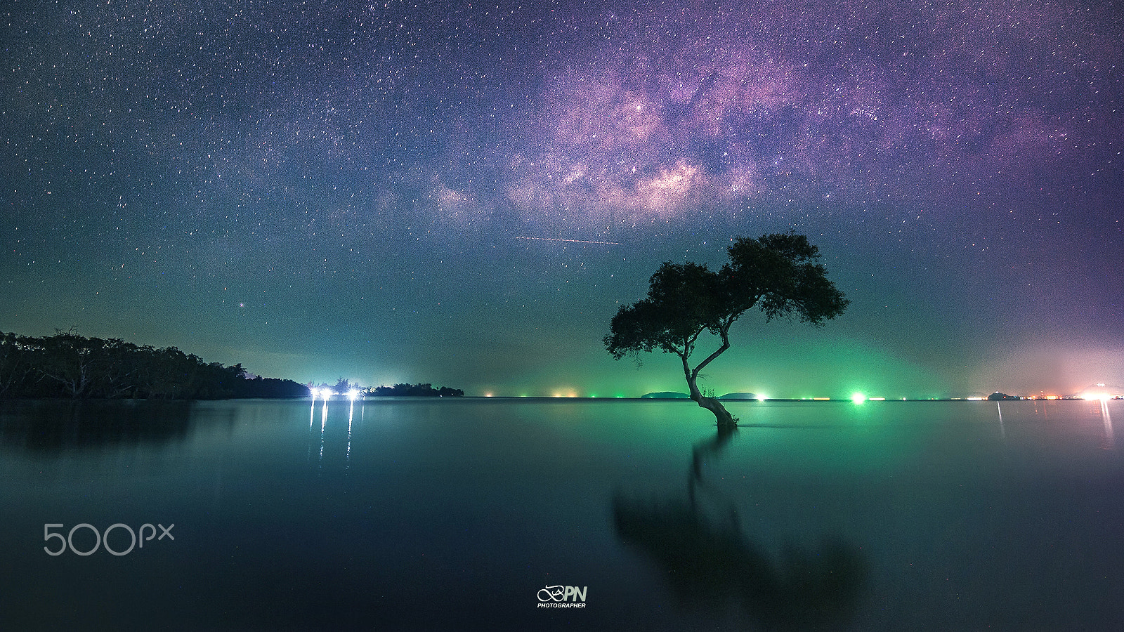 Nikon AF-S Nikkor 16-35mm F4G ED VR sample photo. Milky way and the light of the fishing vessel photography