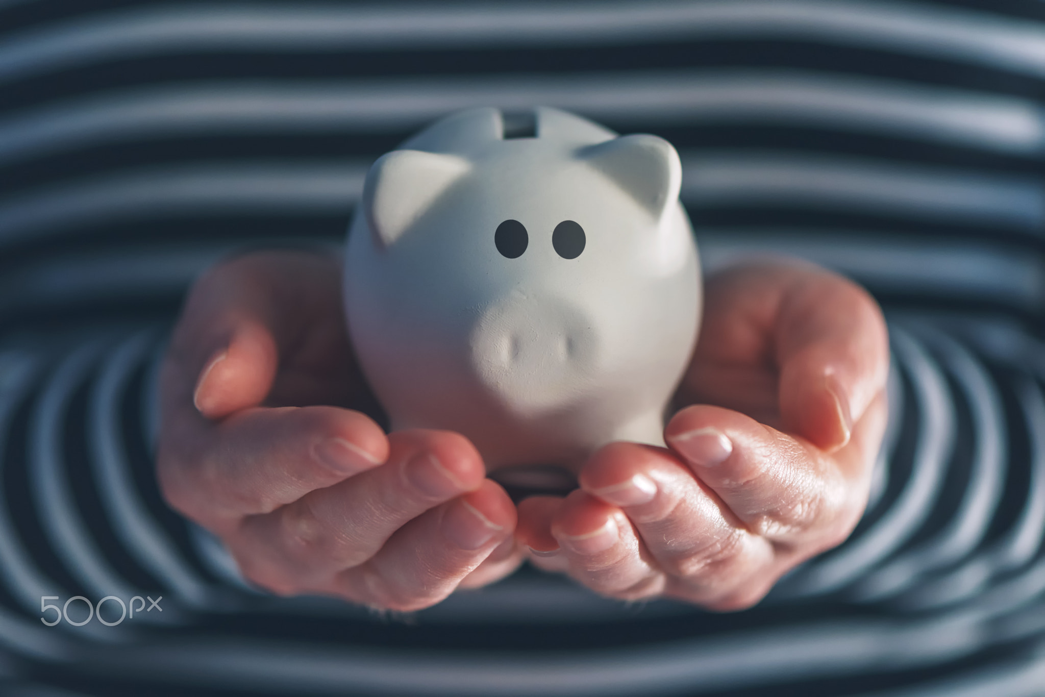 Woman with piggy coin bank