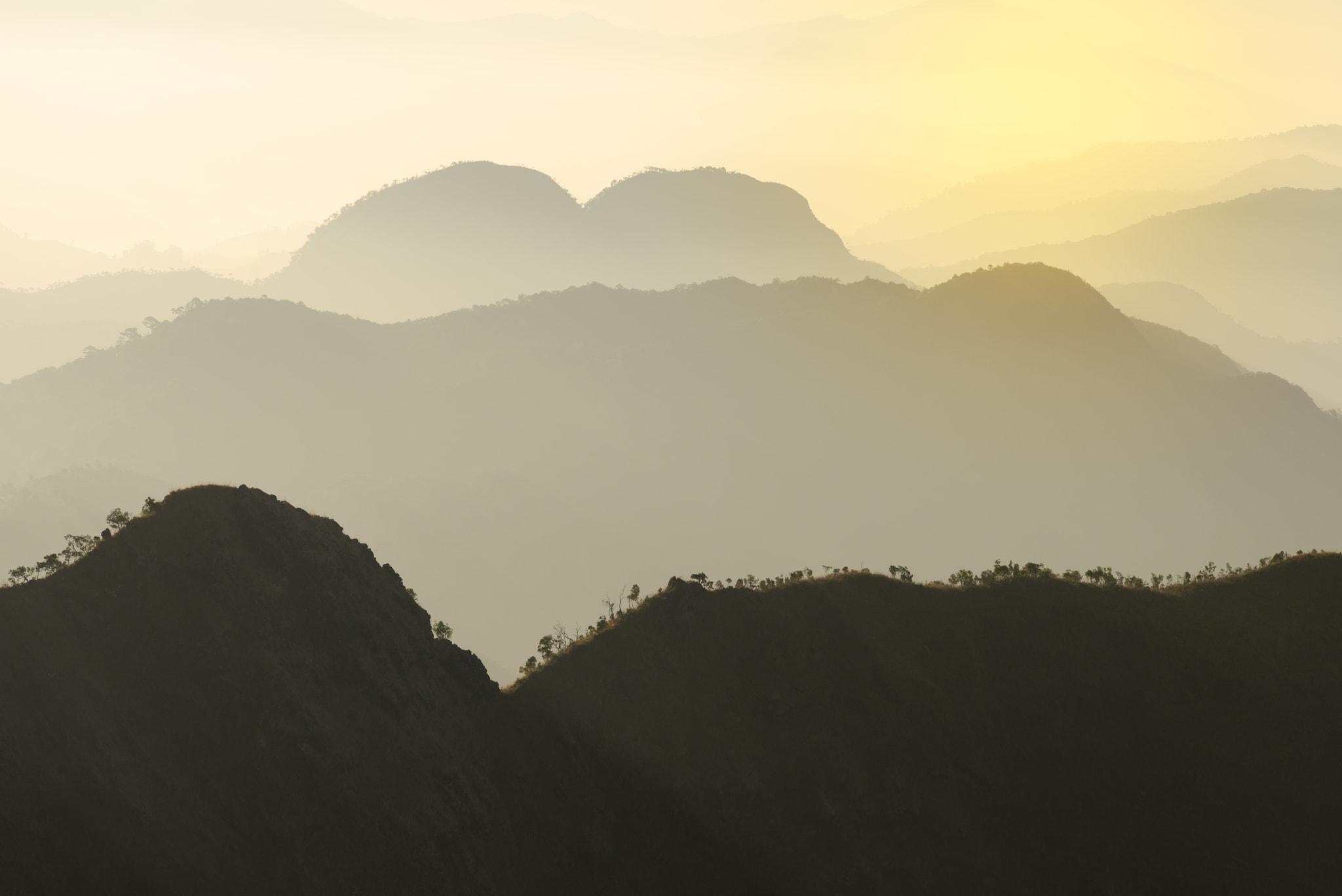 Nikon AF-S Nikkor 70-200mm F4G ED VR sample photo. Beautiful heart shaped mountains with mist at sunrise. photography
