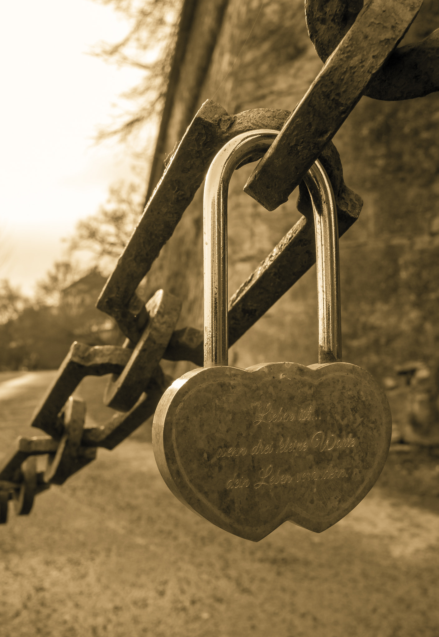 Olympus OM-D E-M10 II + OLYMPUS M.12mm F2.0 sample photo. Love padlock on a chain photography