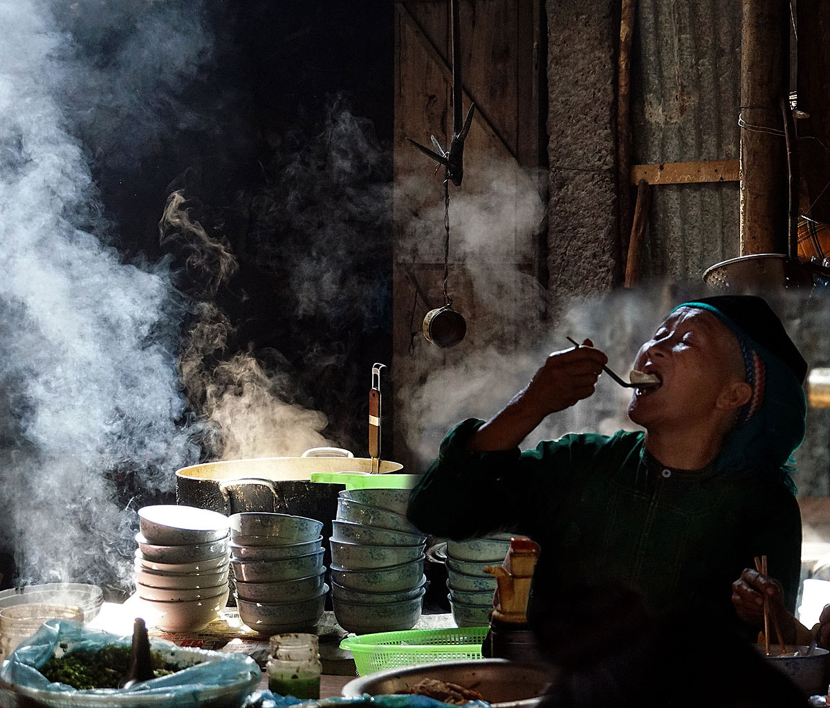 Sony a6000 sample photo. Vietnam, elder woman eating noodles soup photography