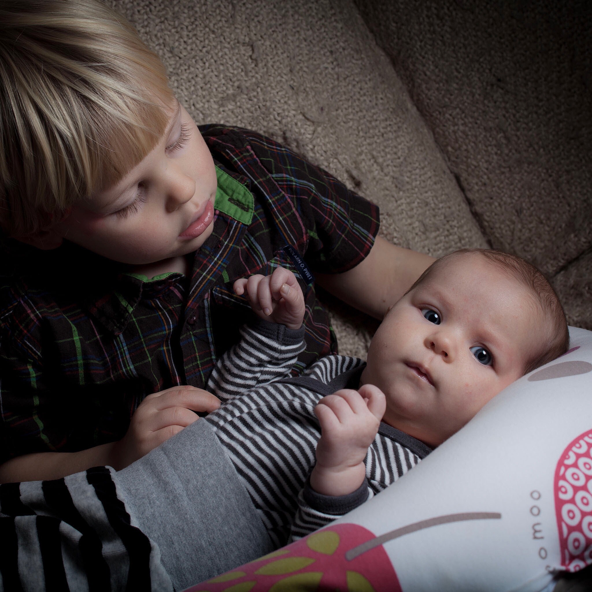 Canon EF 80-200mm f/2.8L sample photo. Big brother is always watching your back, baby sis. photography