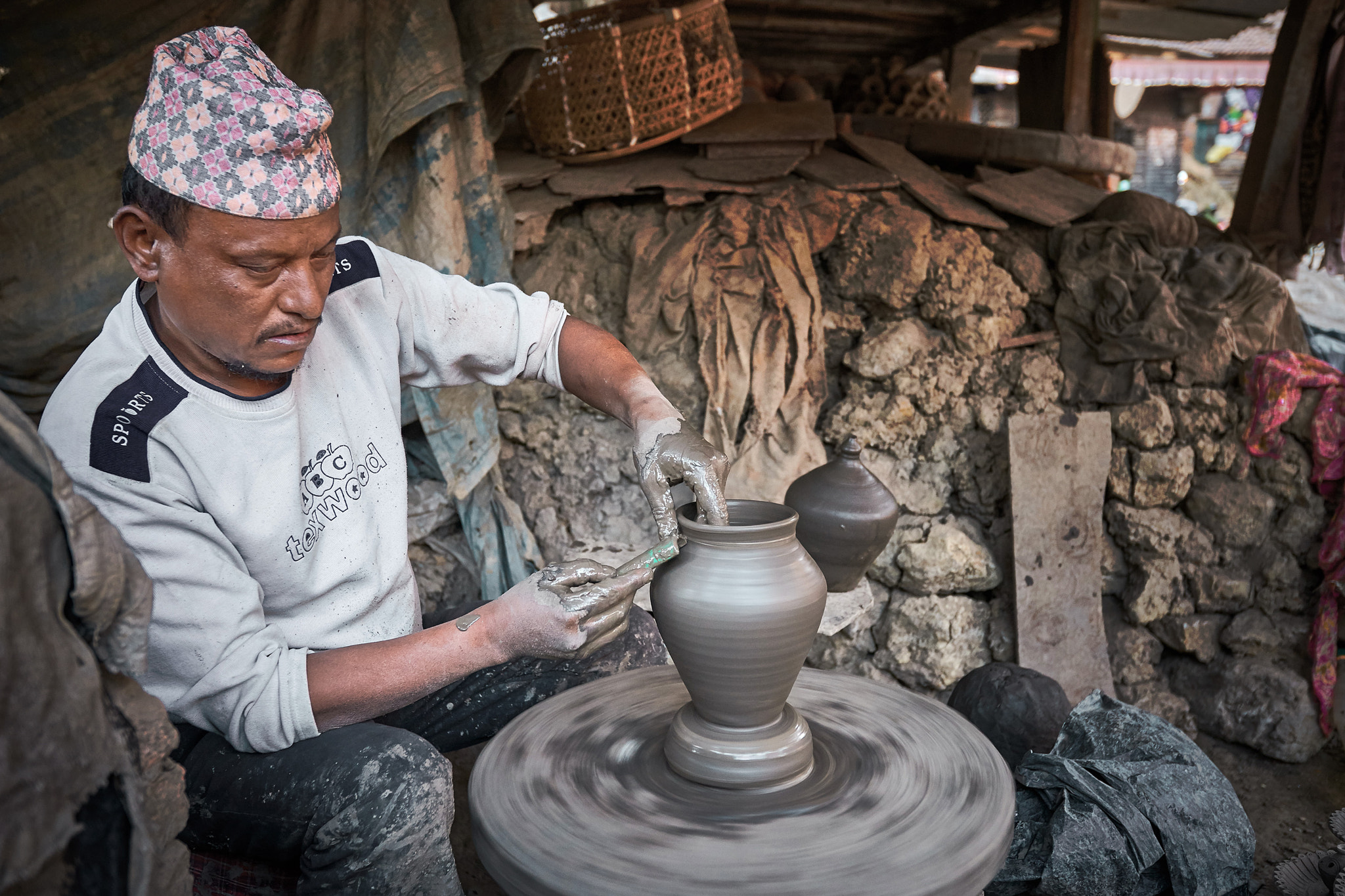 Sony a99 II sample photo. Nepali potter photography