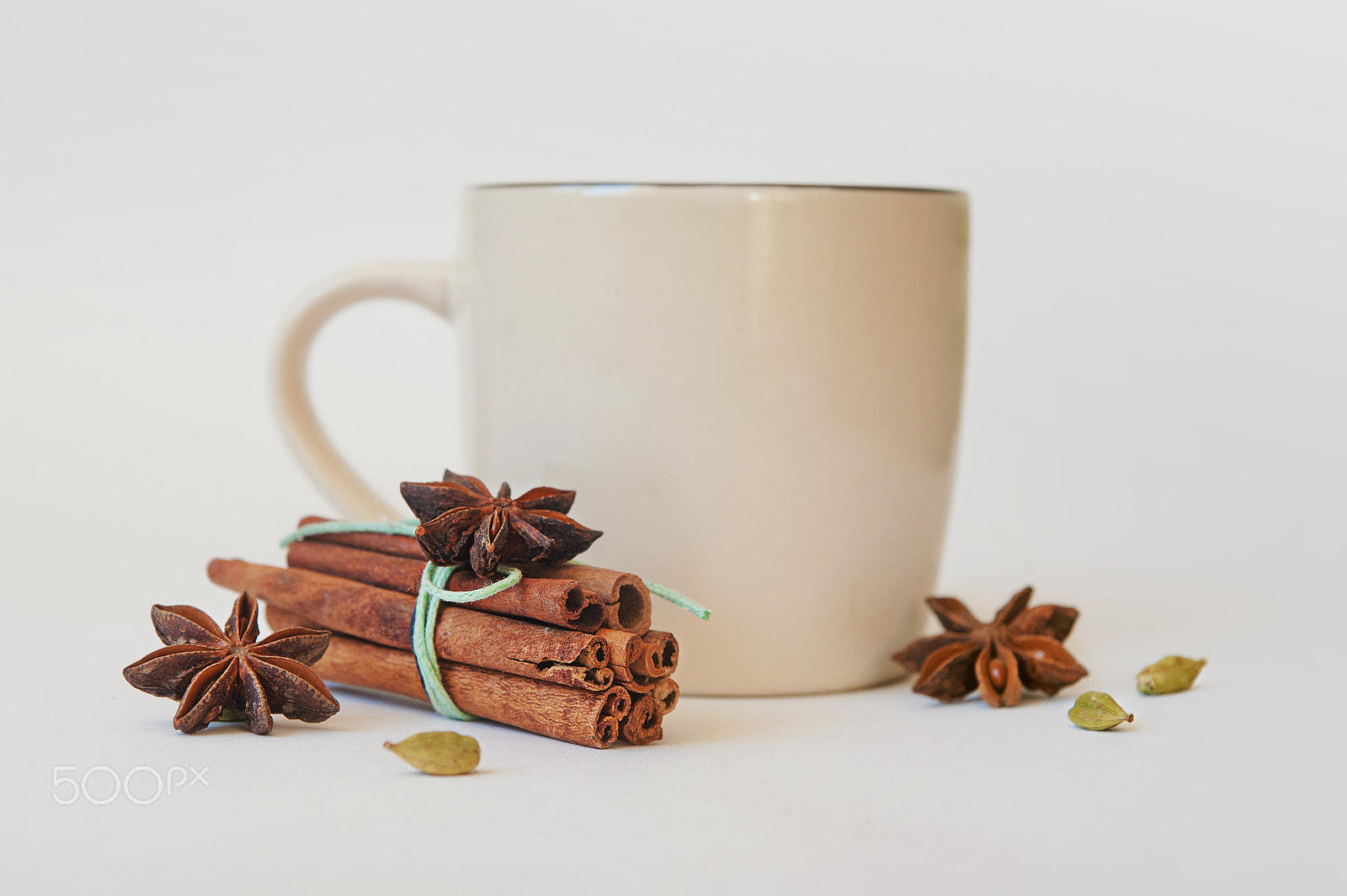 Nikon D700 + Sigma 24-70mm F2.8 EX DG Macro sample photo. A few anise stars, cassia cinnamon sticks, dried orange rings and fruit tea on the tablecloth photography