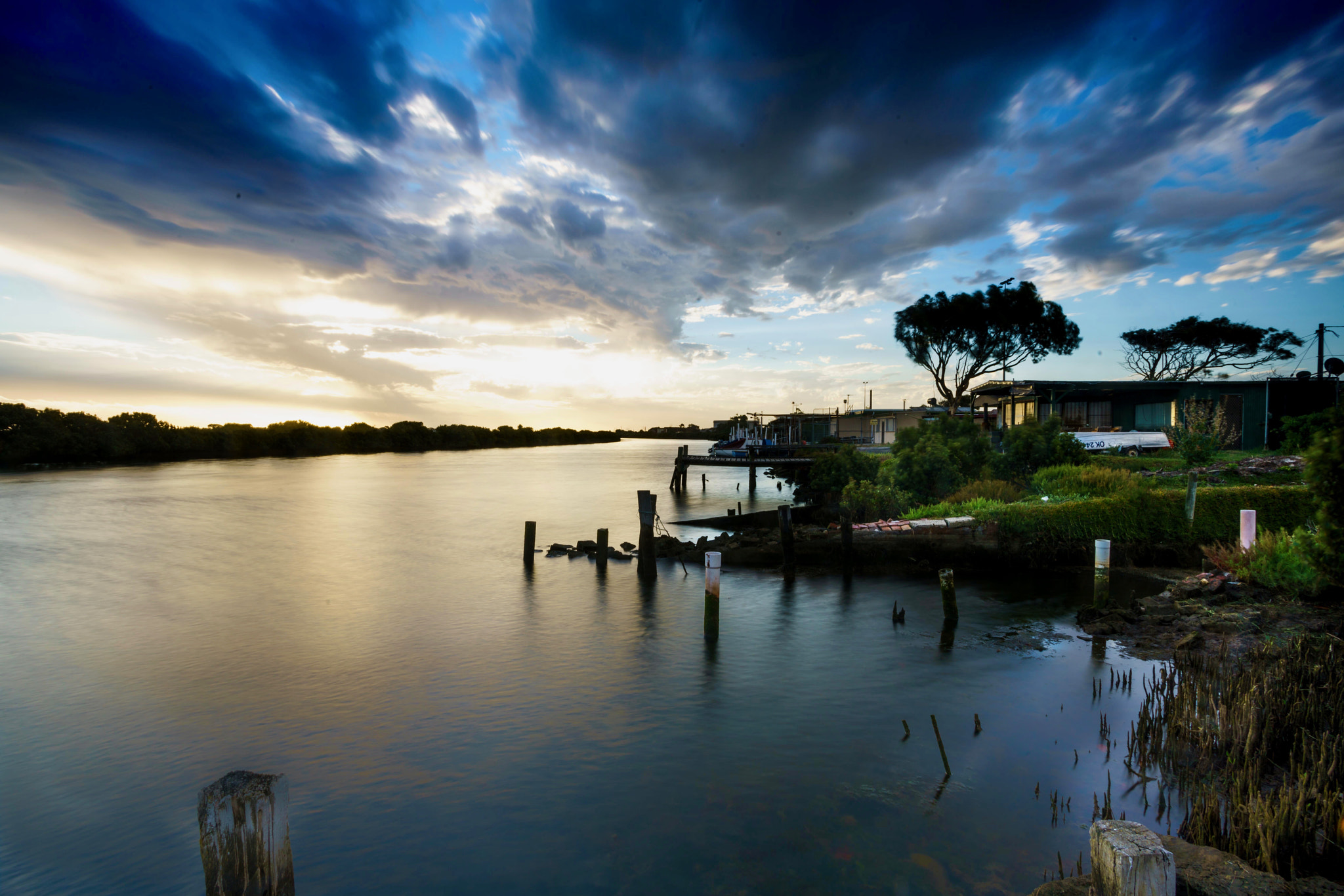 Sony a7R II + Canon EF 17-40mm F4L USM sample photo. Boat huts photography