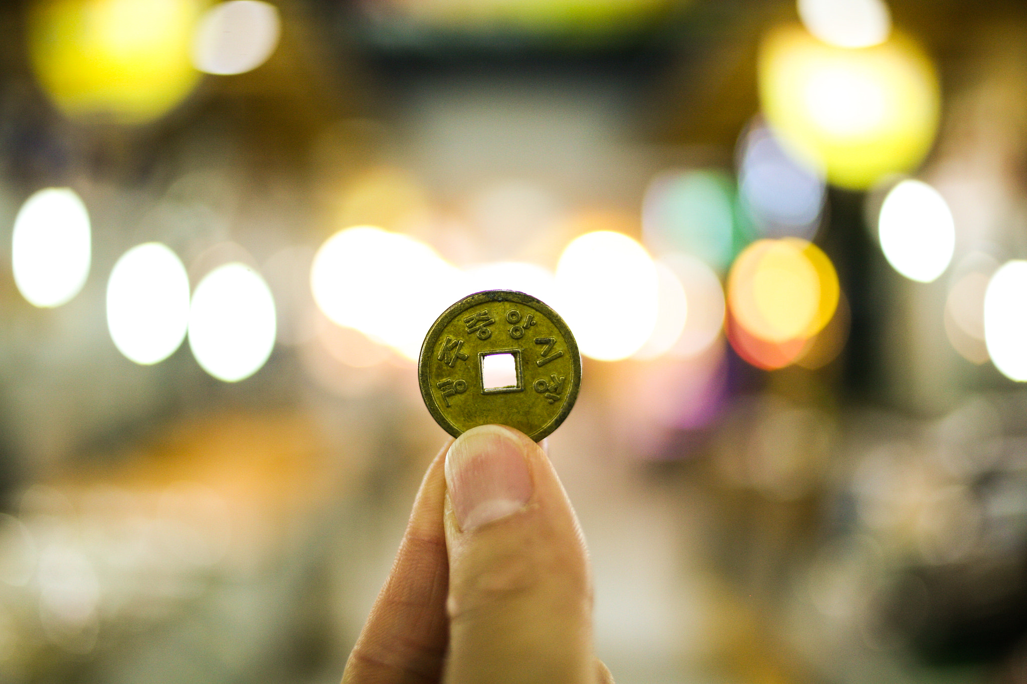 Canon EOS 5D + Canon EF 35mm F2 sample photo. Market parking coin photography