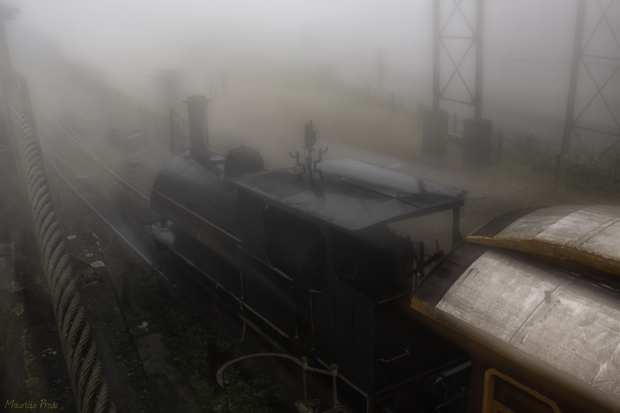 Canon EOS 50D + Canon EF-S 18-55mm F3.5-5.6 IS STM sample photo. Train waiting for ghost passengers on foggy day photography