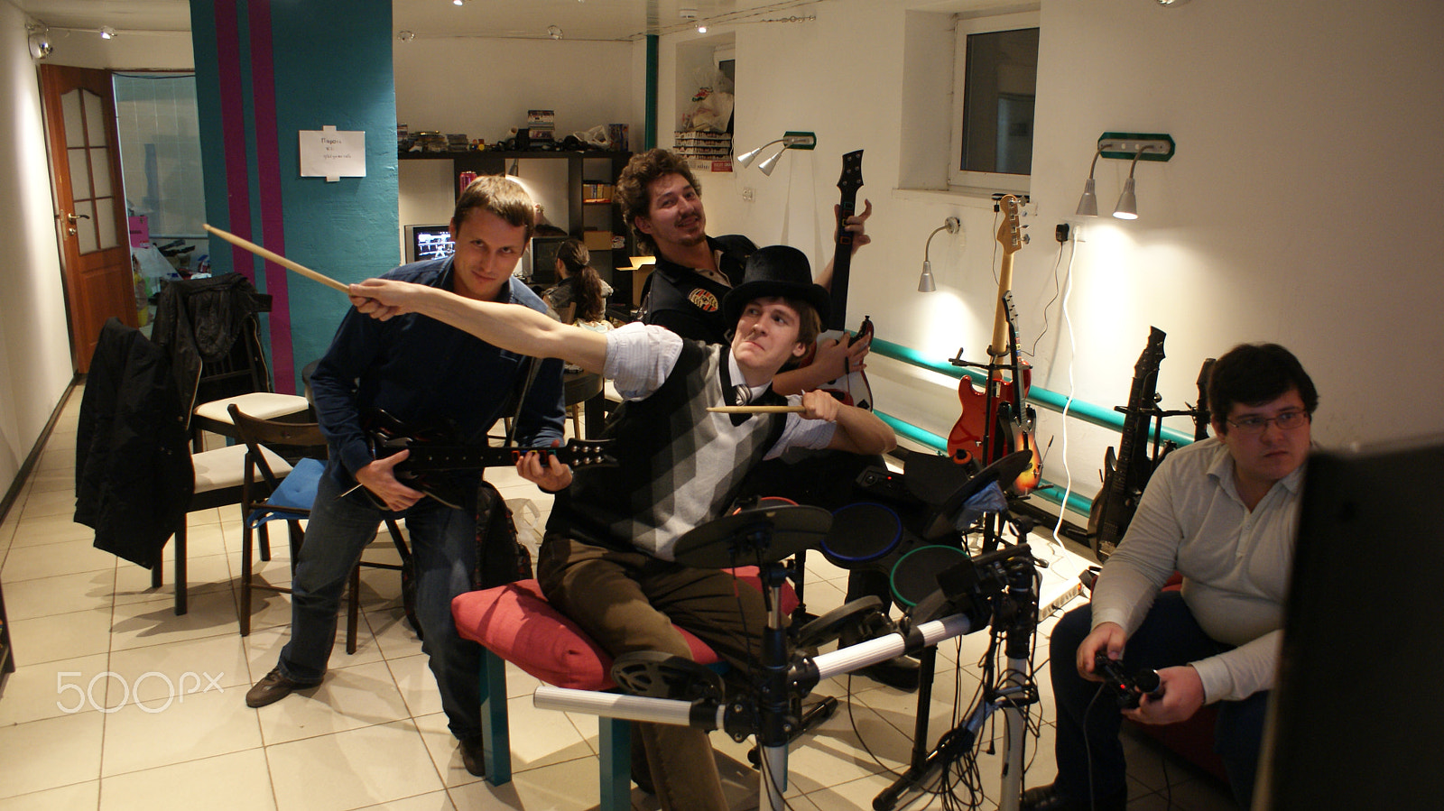 Sony Alpha DSLR-A300 sample photo. Group of guitar hero photography