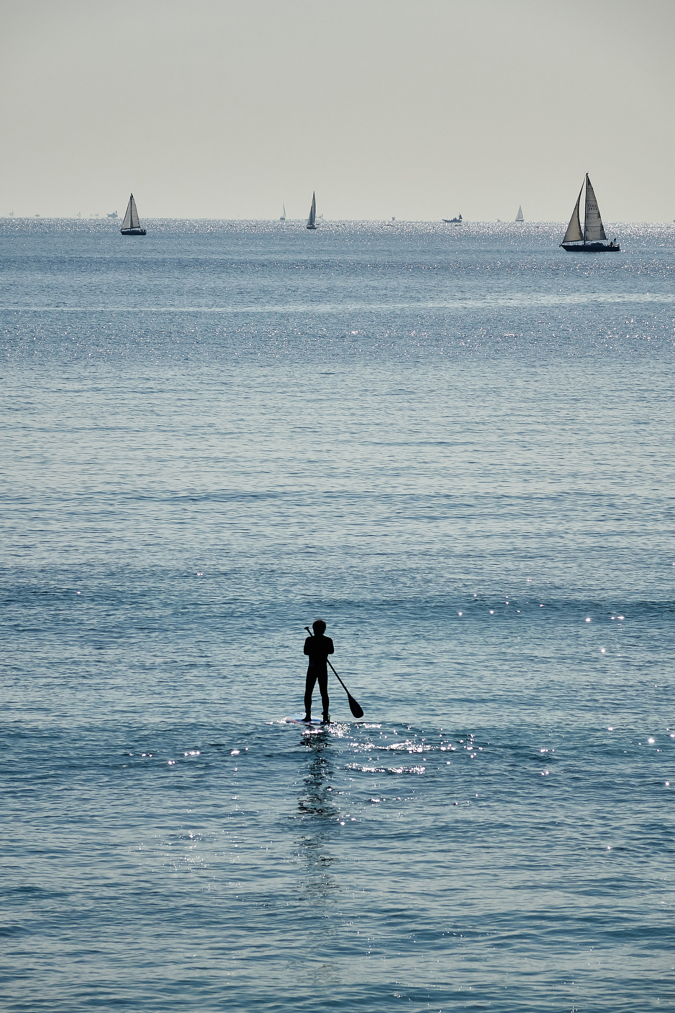 Sony Cyber-shot DSC-RX10 sample photo. A man and sailboats photography