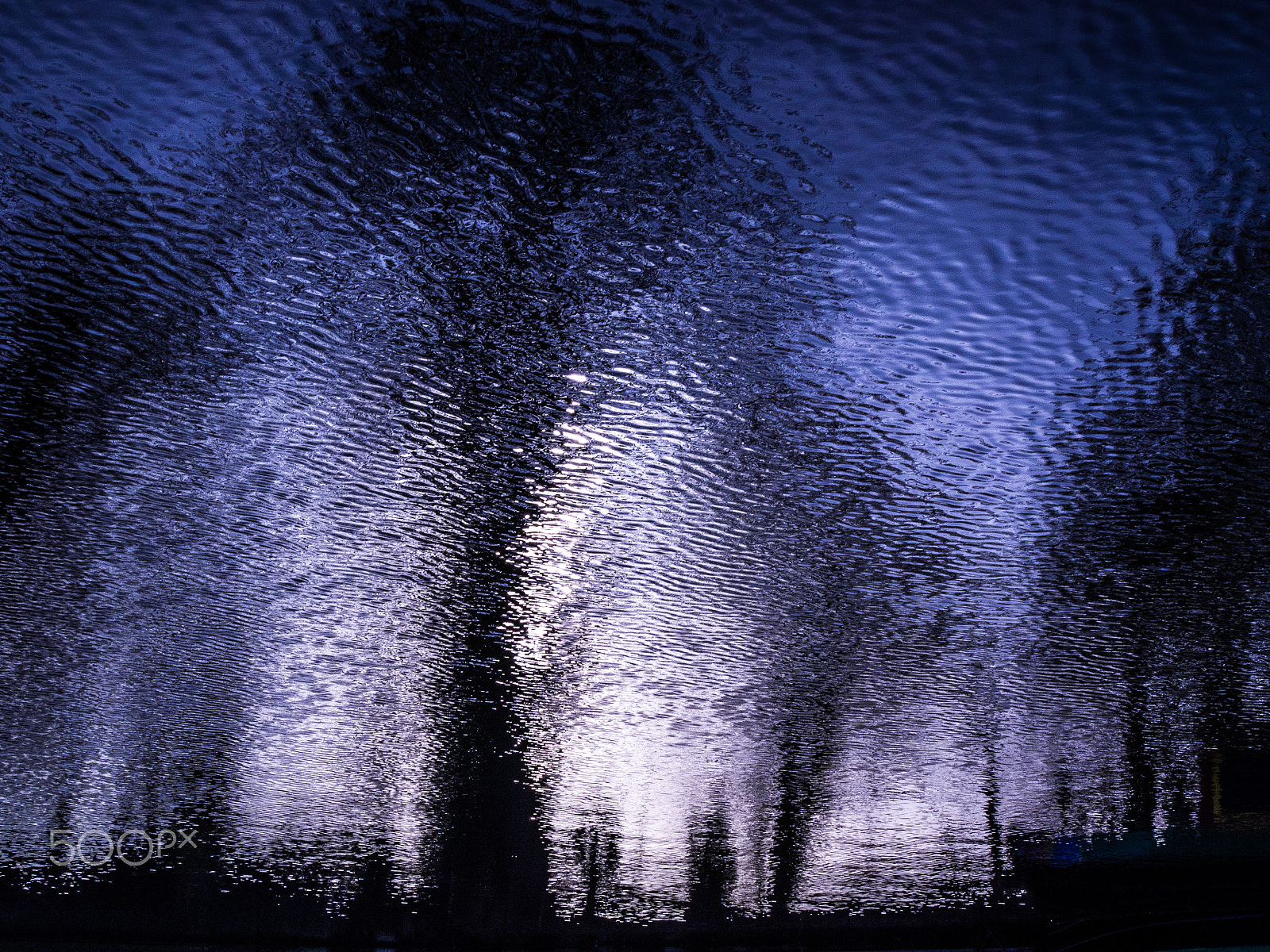 Olympus OM-D E-M1 + Olympus M.Zuiko Digital 25mm F1.8 sample photo. Reflection of winter trees in a canal photography