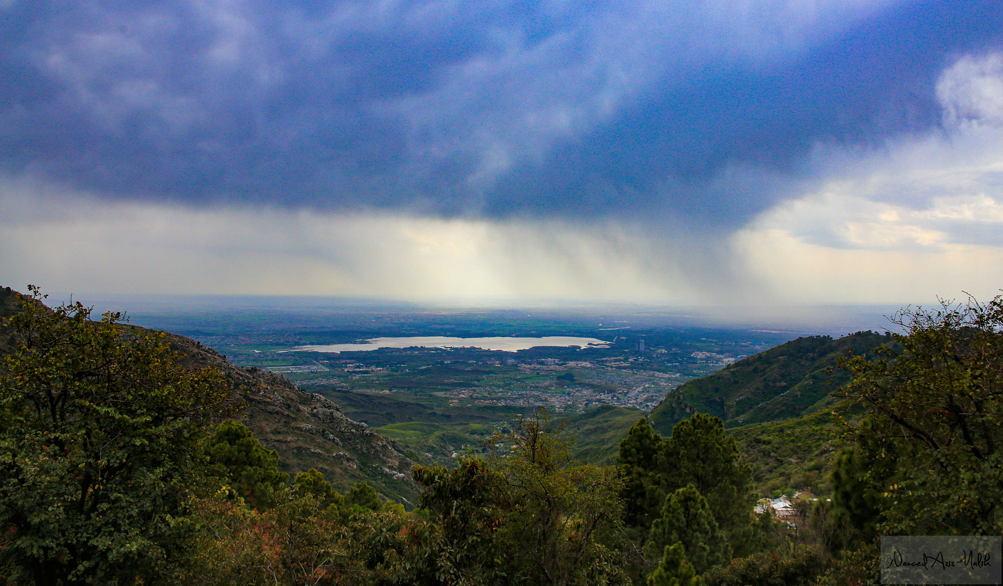 Canon EF 400mm f/2.8L sample photo. Rain over the capital photography