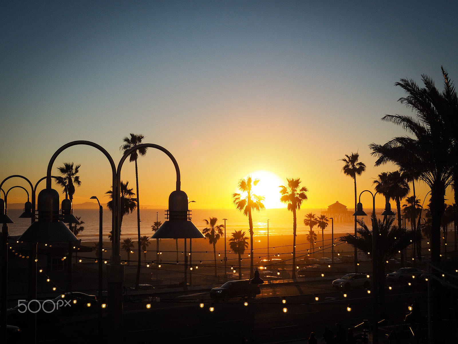 Olympus OM-D E-M10 II + Olympus M.Zuiko Digital ED 12-40mm F2.8 Pro sample photo. Sunset in huntington beach photography