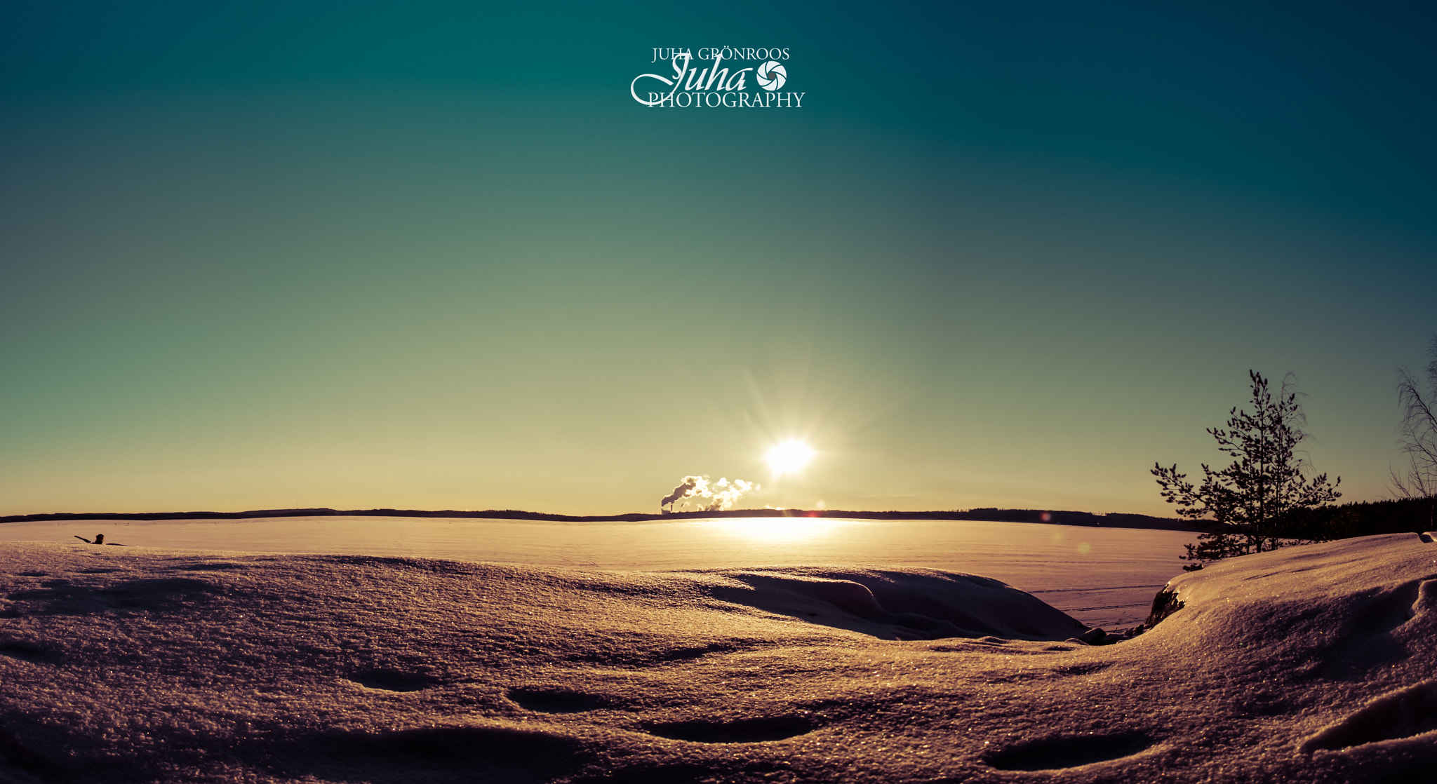 Sigma 17-70mm F2.8-4 DC Macro OS HSM sample photo. Footsteps in snow photography